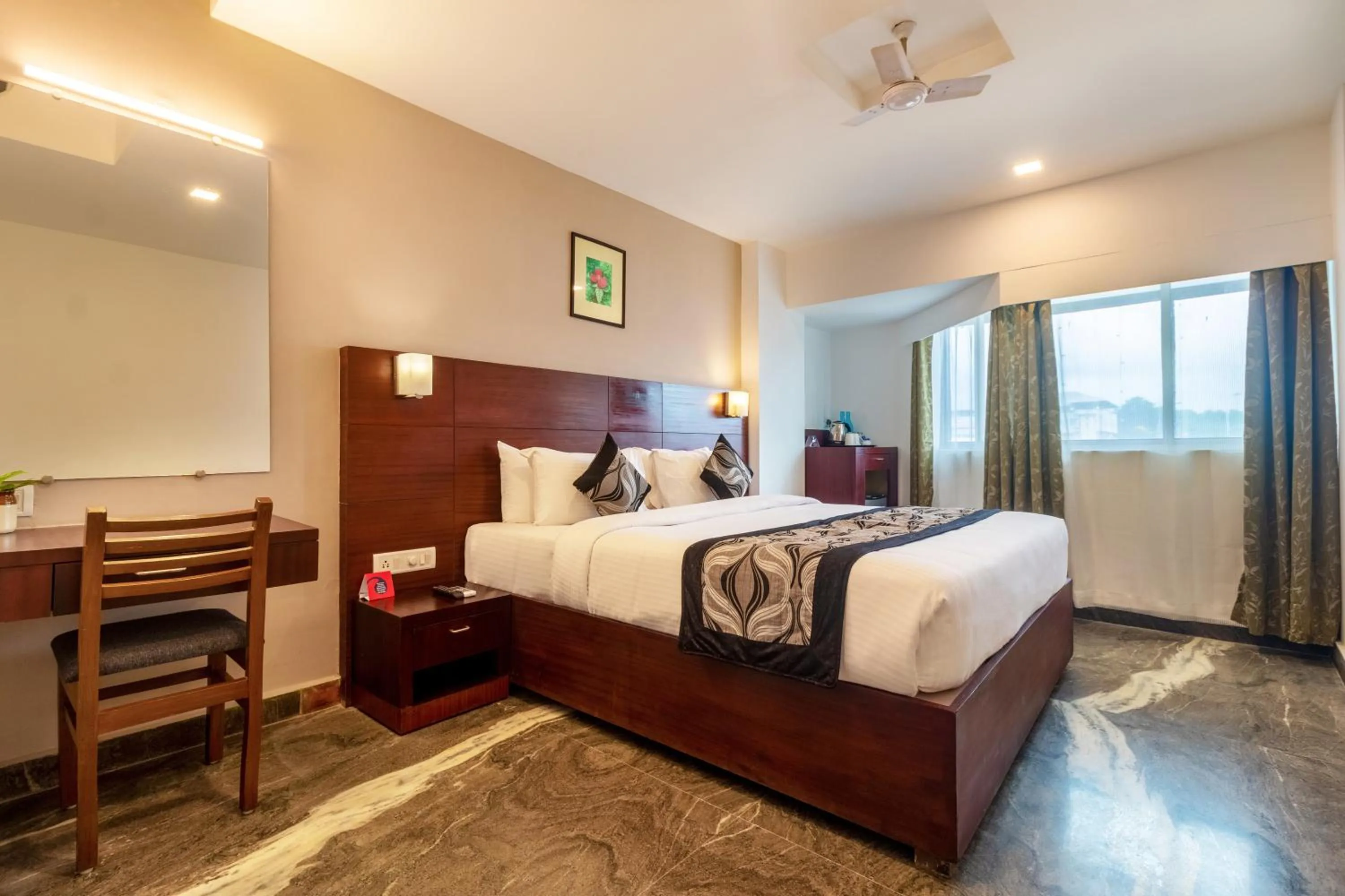 Photo of the whole room, Bed in Zip By Spree Hotels Mangala Towers Thrissur