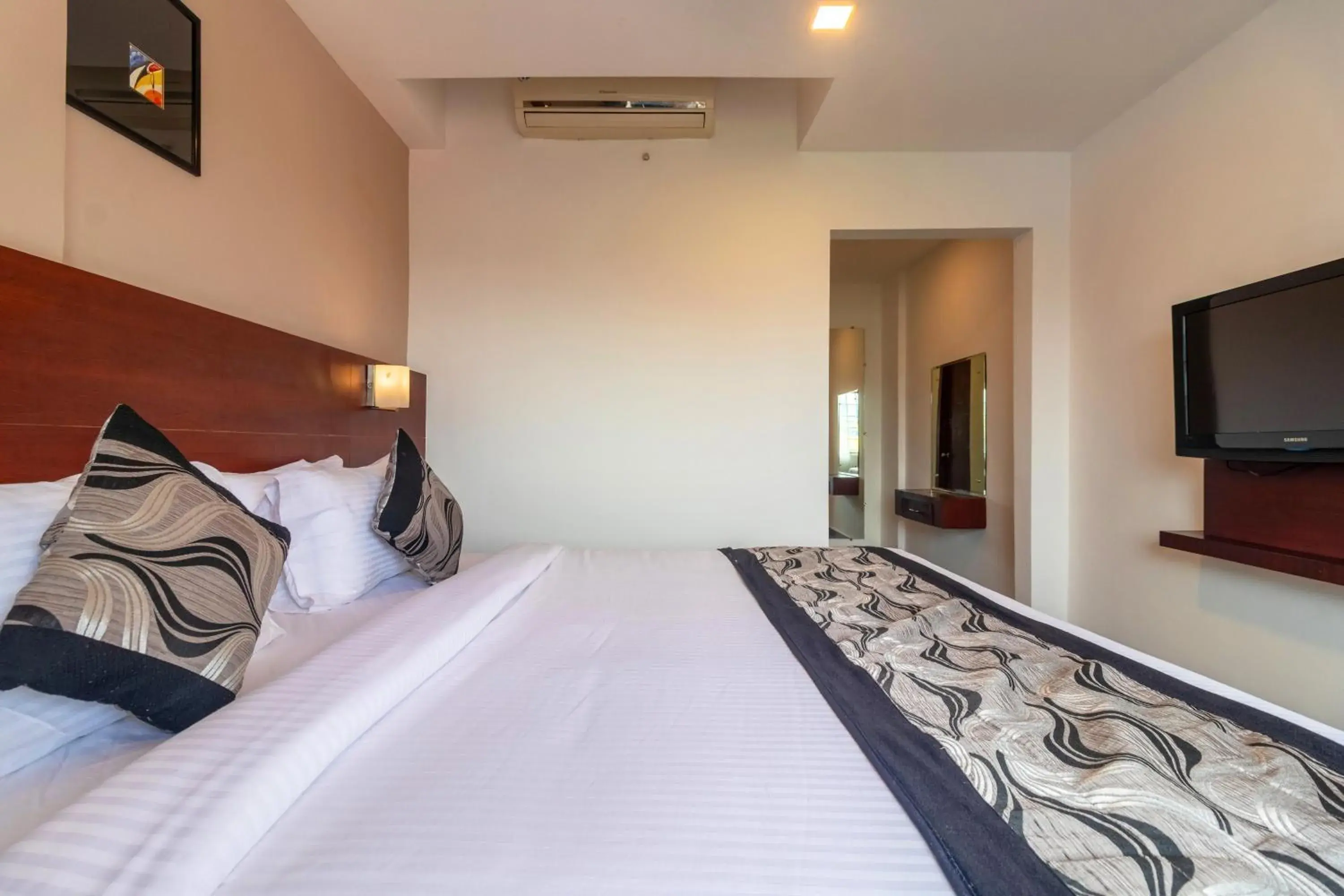 Bed in Zip By Spree Hotels Mangala Towers Thrissur Bed in Zip By Spree Hotels Mangala Towers Thrissur