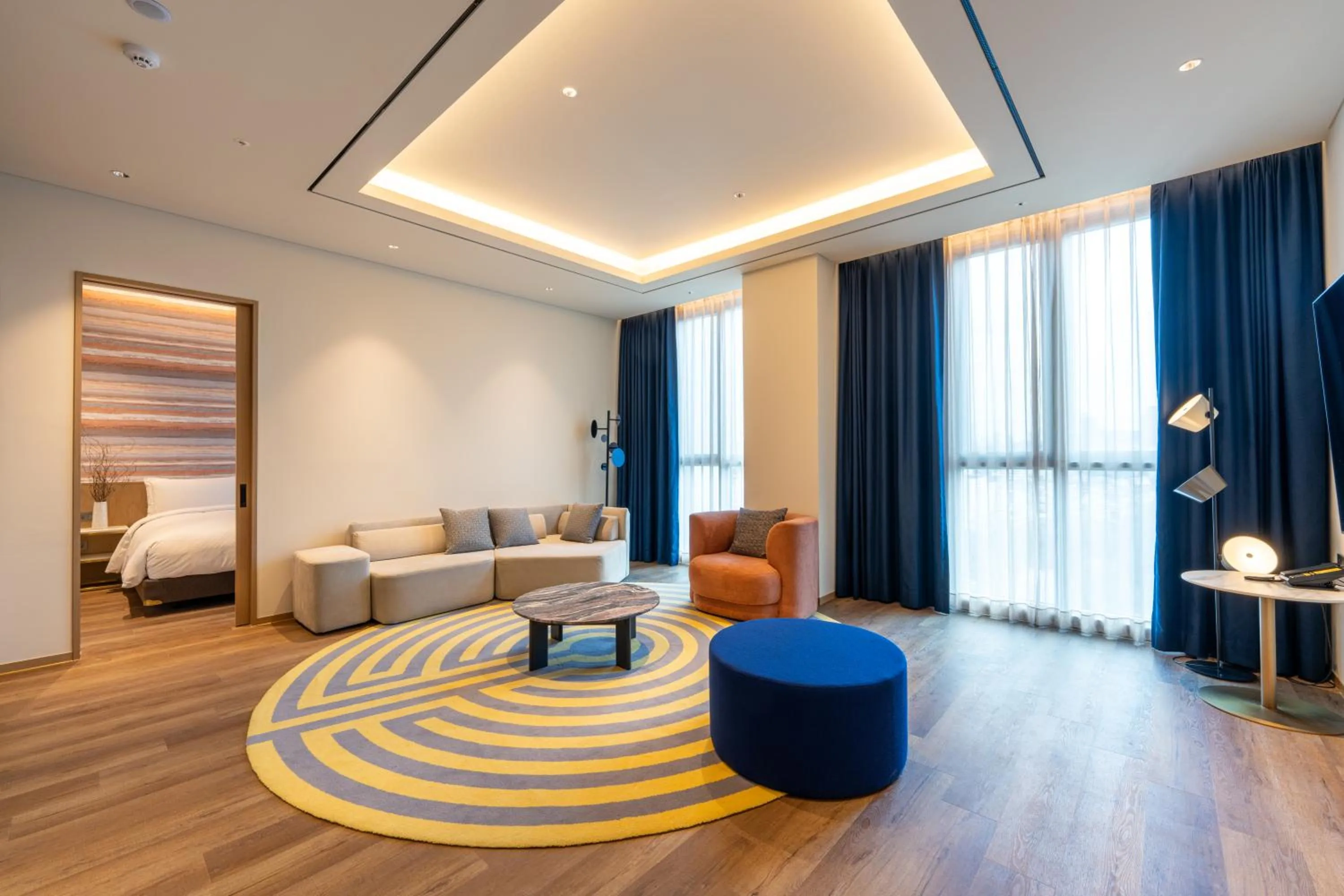 Living room, Bed in voco Seoul Gangnam by IHG