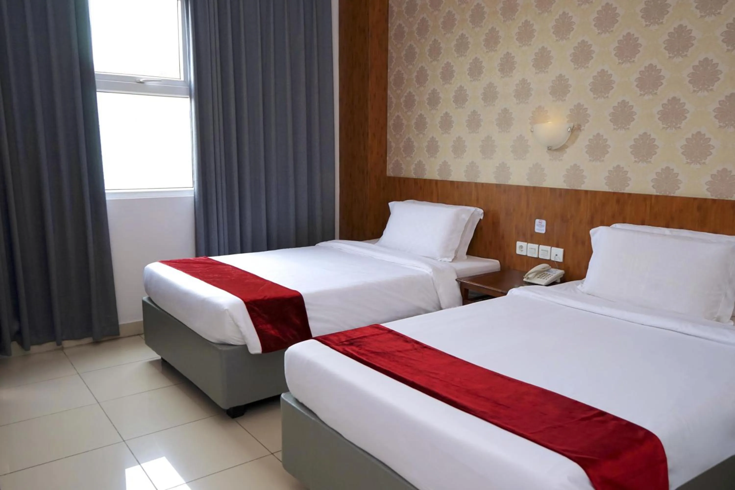 Bed in Marilyn Hotel Serpong