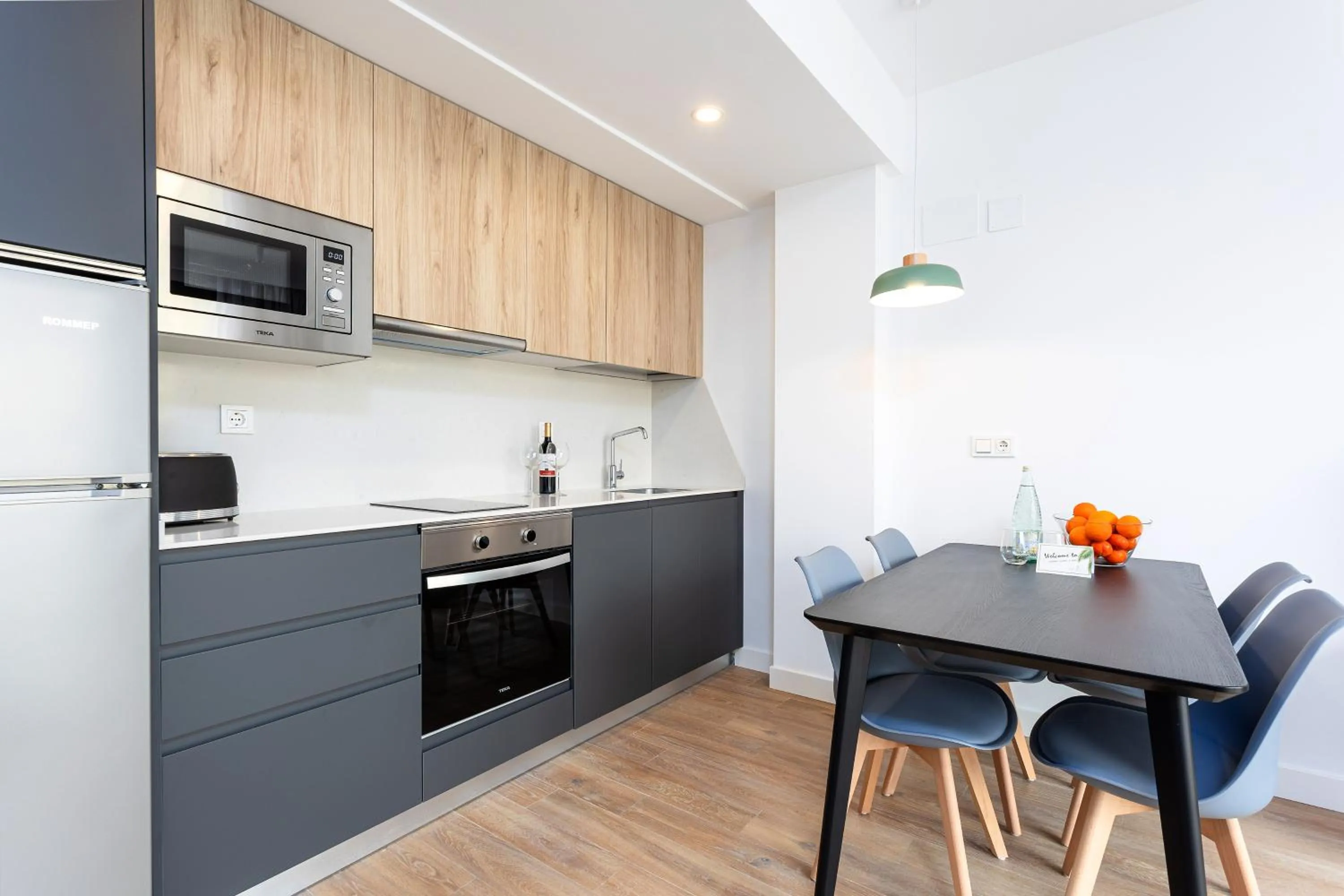 Kitchen or kitchenette in Caleyro Boutique Apartments - "Parking incluido"