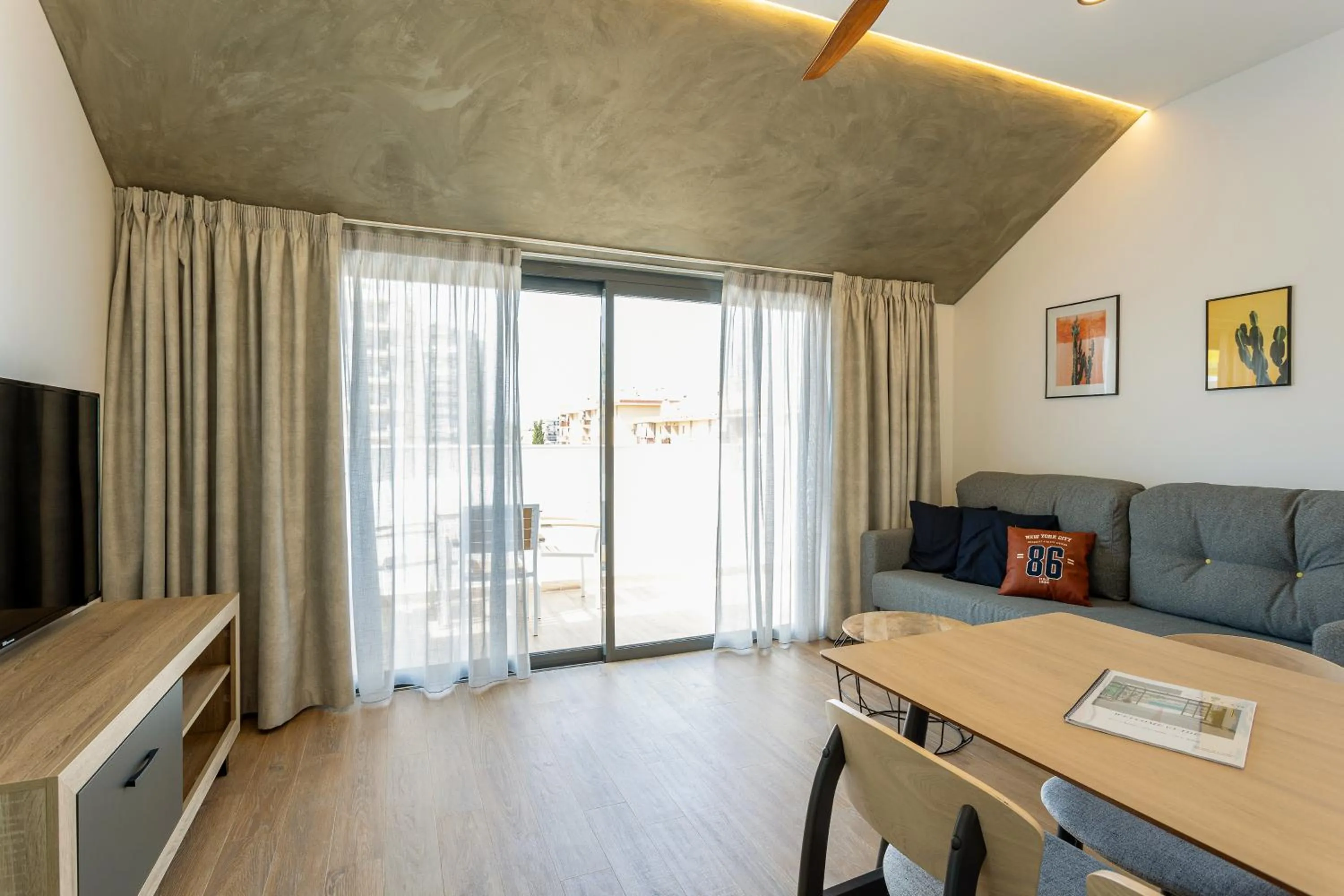 TV and multimedia in Caleyro Boutique Apartments - "Parking incluido"
