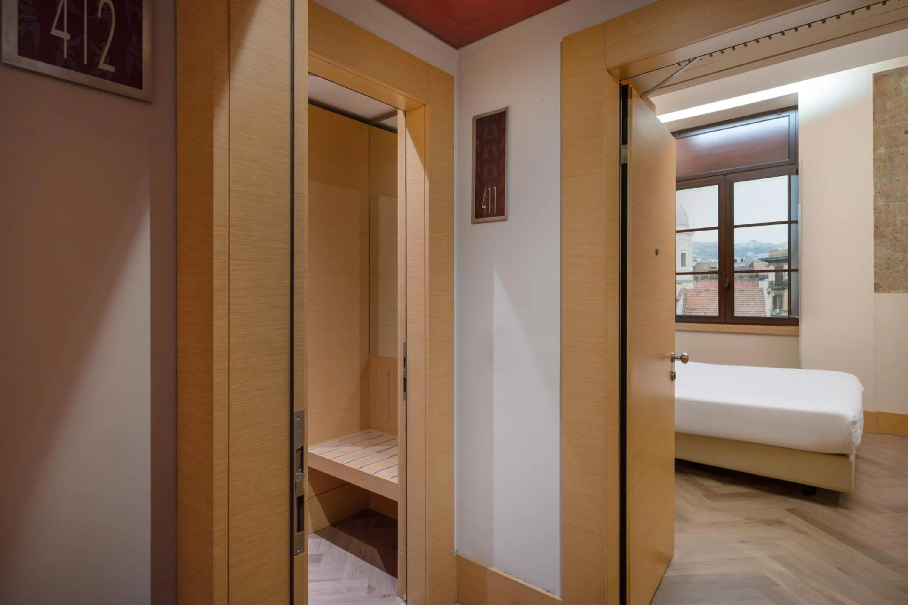 Bedroom, Bed in UNA Hotels Napoli