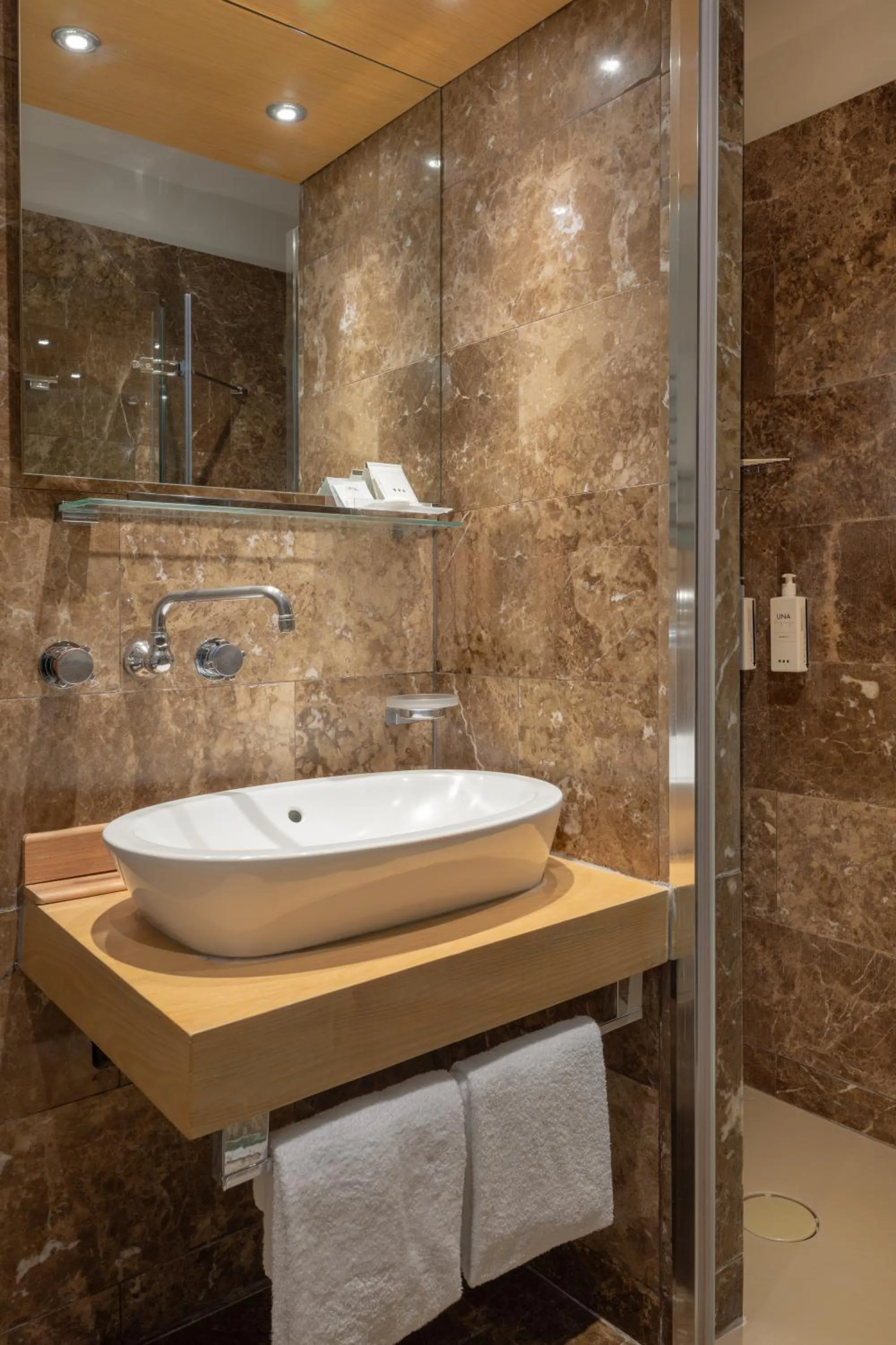 Bathroom in UNA Hotels Napoli