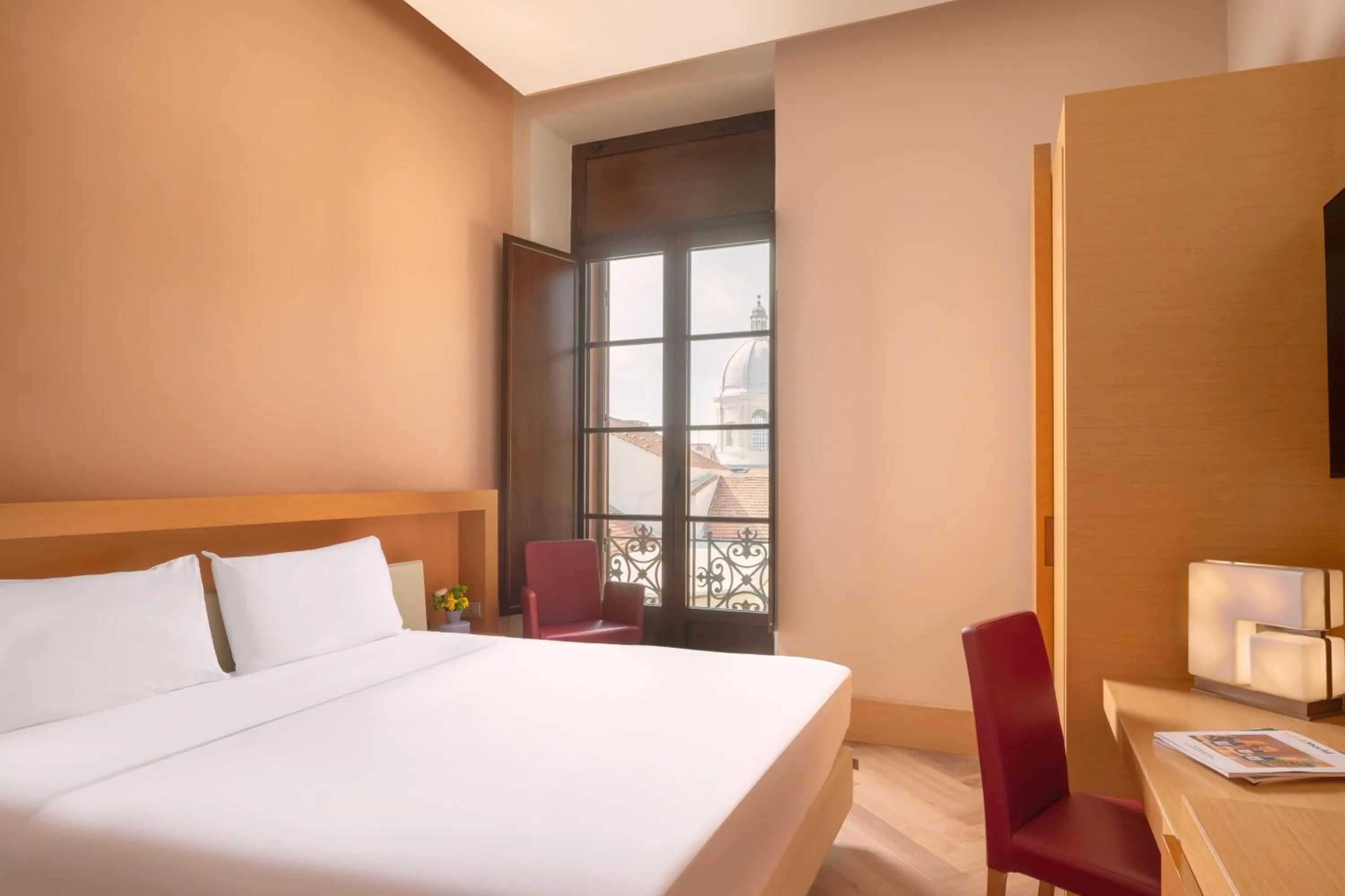 Bedroom, Bed in UNA Hotels Napoli