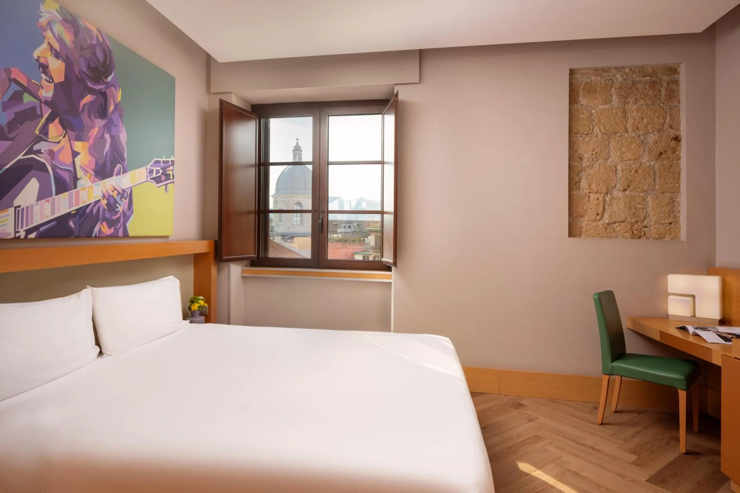 Bedroom, Bed in UNA Hotels Napoli