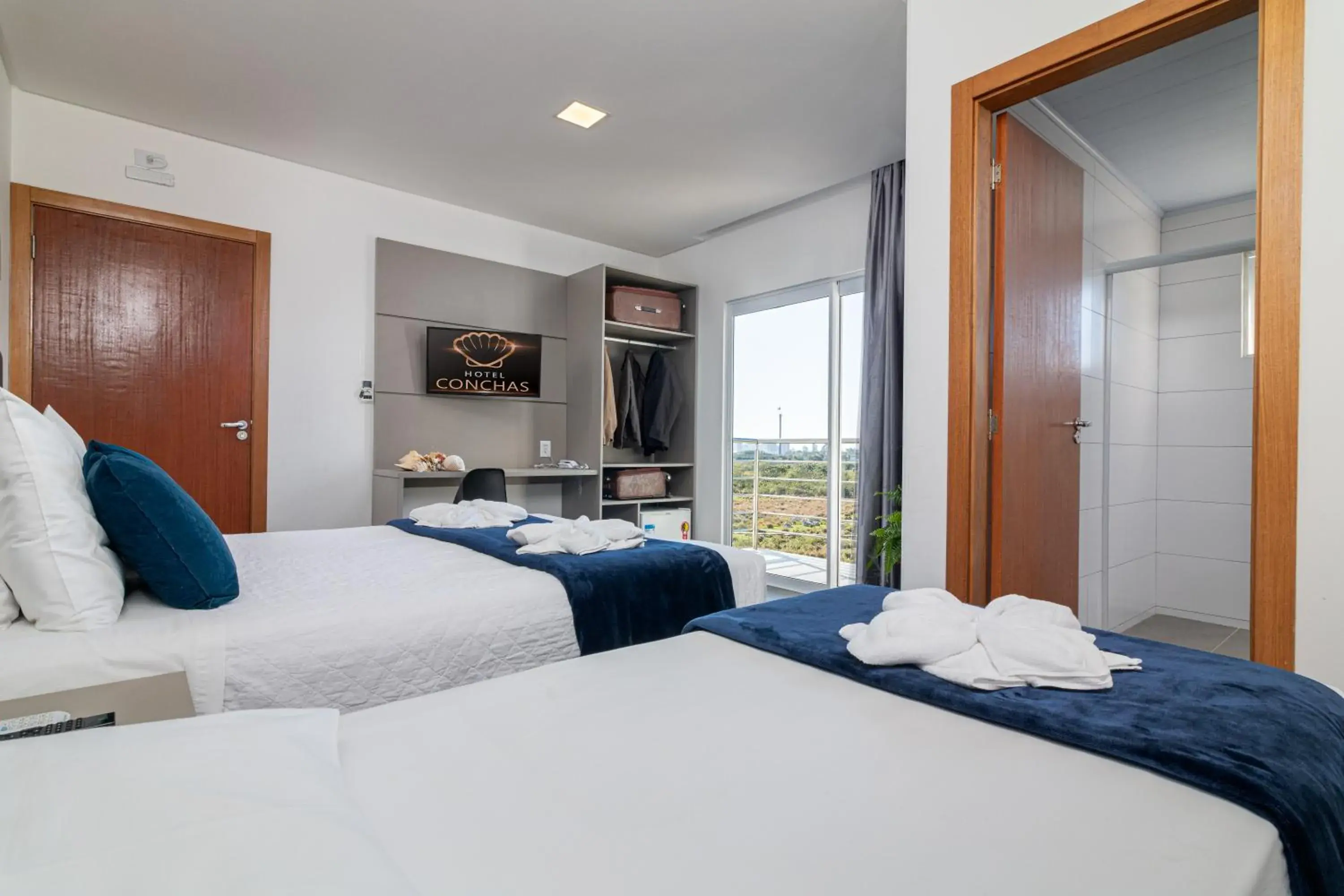 Triple Room with Balcony - single occupancy in Hotel Conchas Triple Room with Balcony - single occupancy in Hotel Conchas