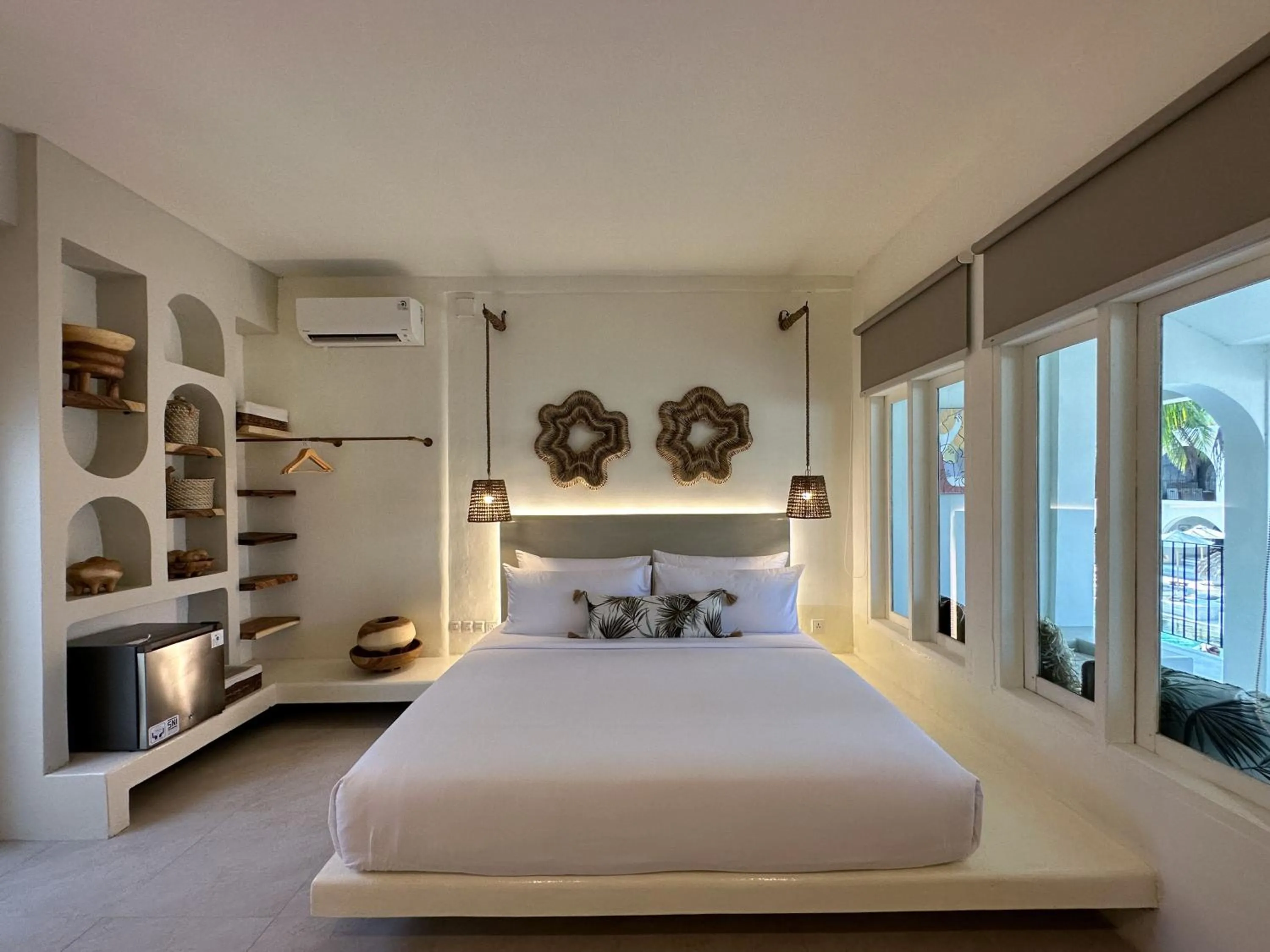 Bed in El Tropico Boutique Hotel