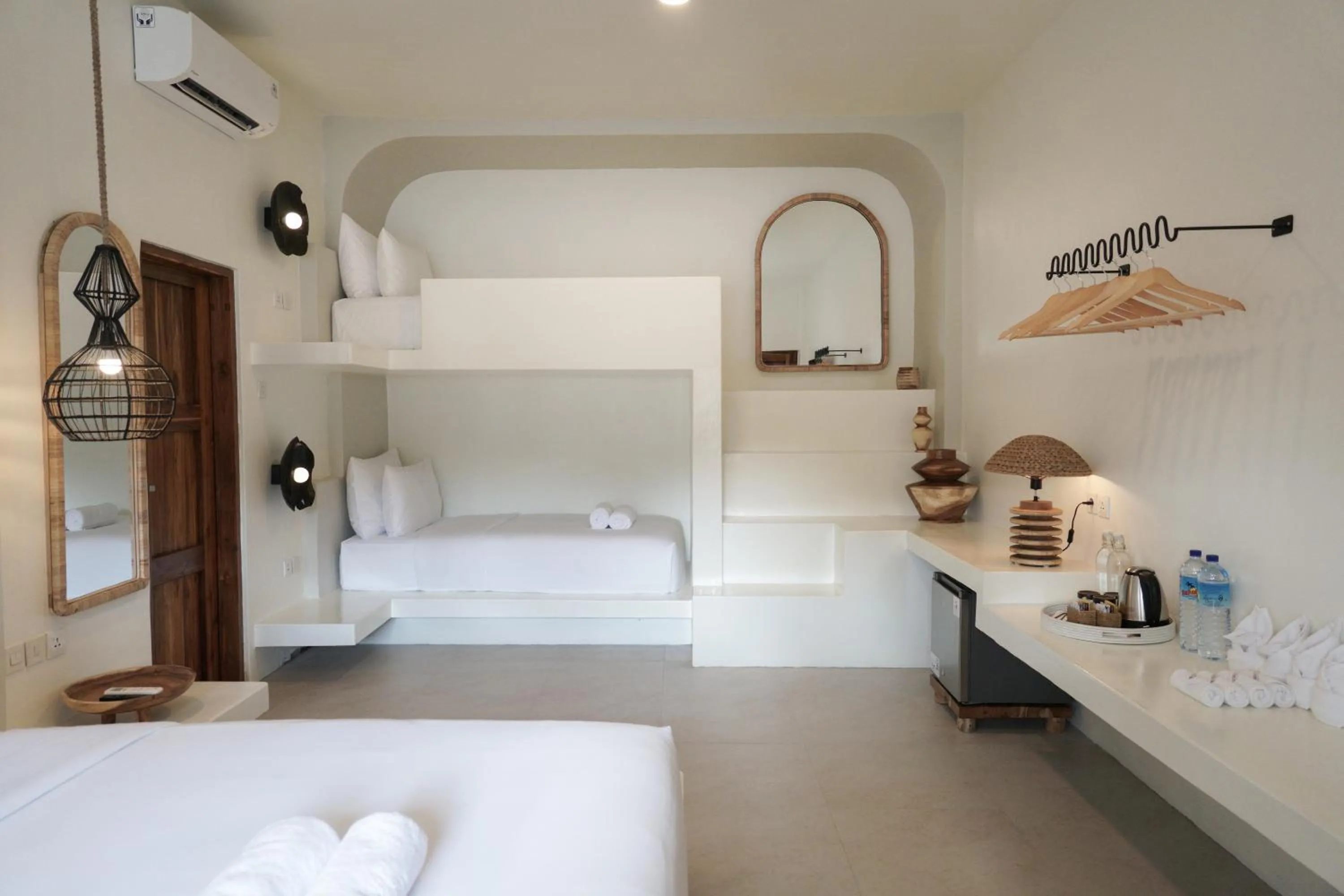 Bed in El Tropico Boutique Hotel
