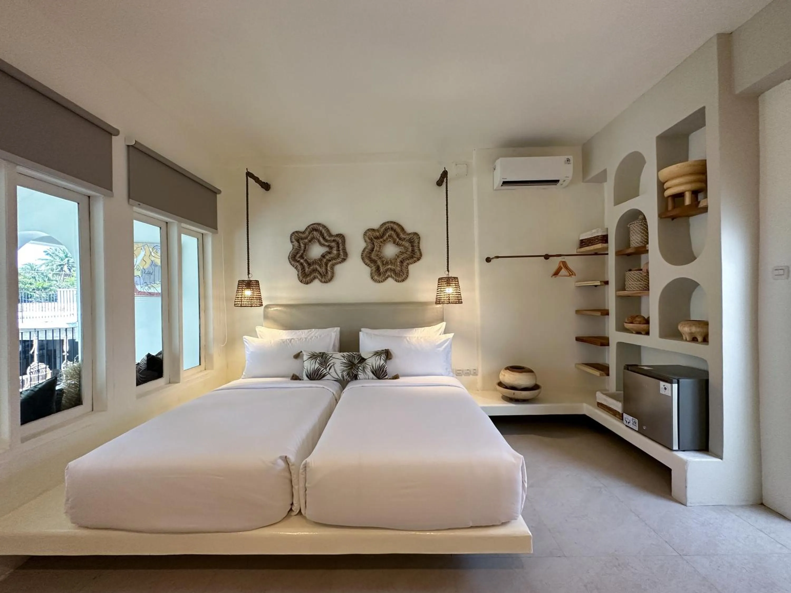 Bed in El Tropico Boutique Hotel