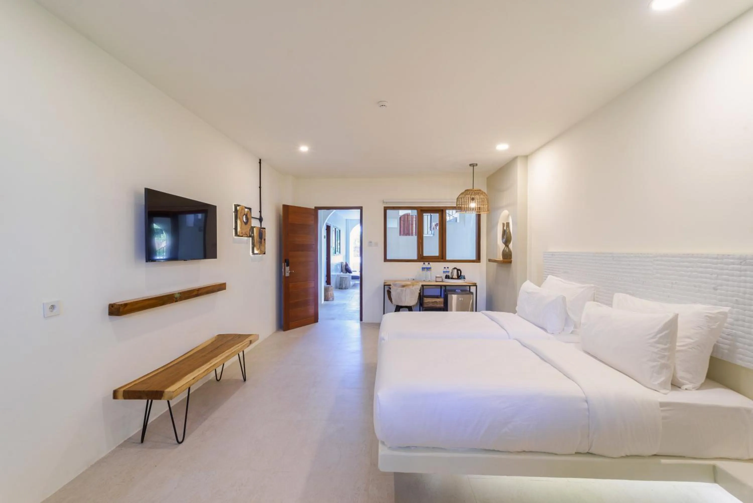 Bed in El Tropico Boutique Hotel