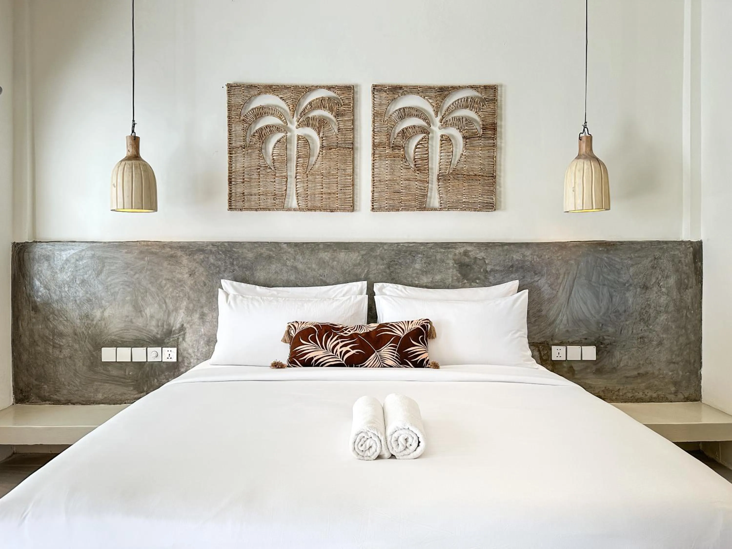 Bed in El Tropico Boutique Hotel