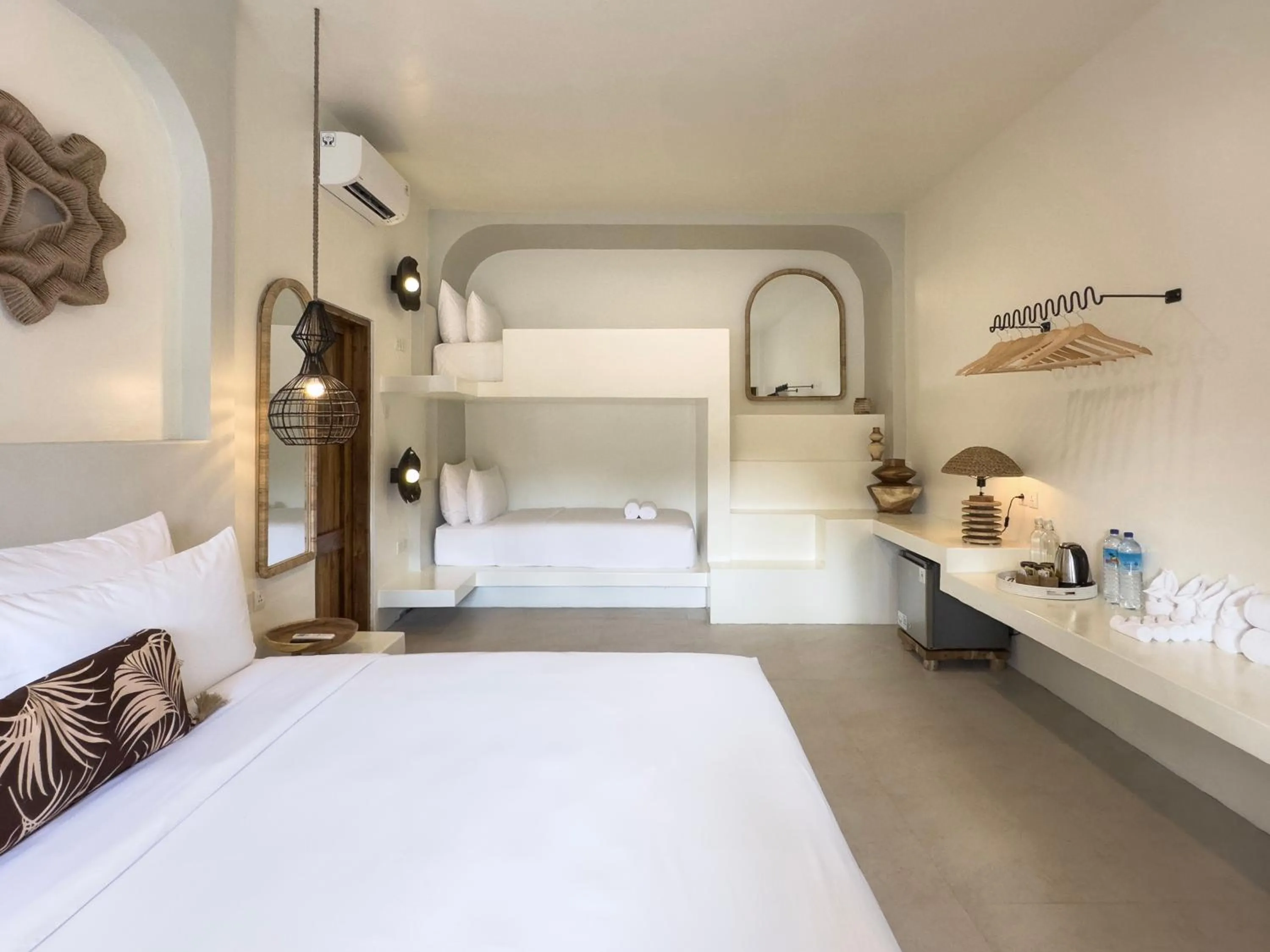 Bed in El Tropico Boutique Hotel