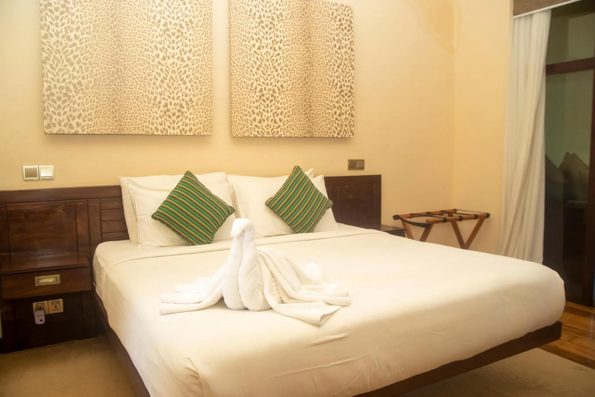 Bed in NIKARA Luxury Beach House