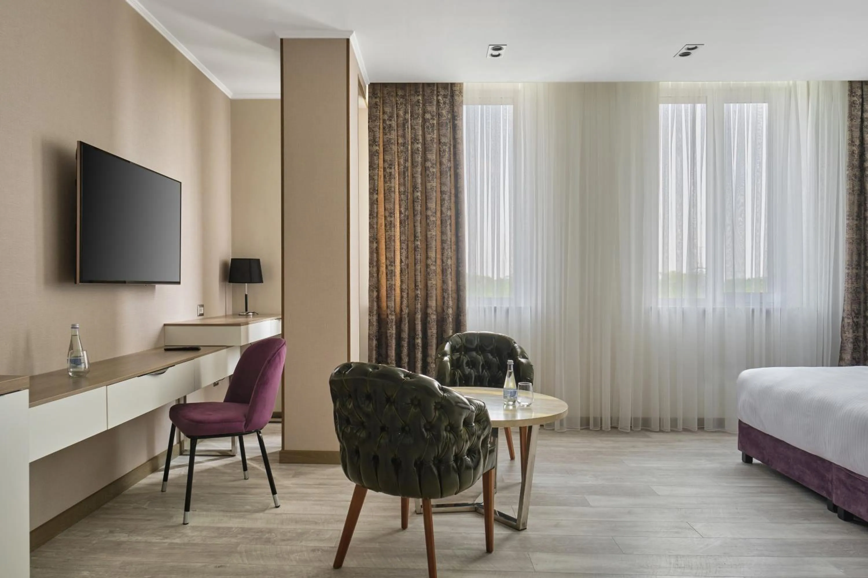 TV and multimedia, Bed in Panarams Tashkent Hotel, a member of Radisson Individuals