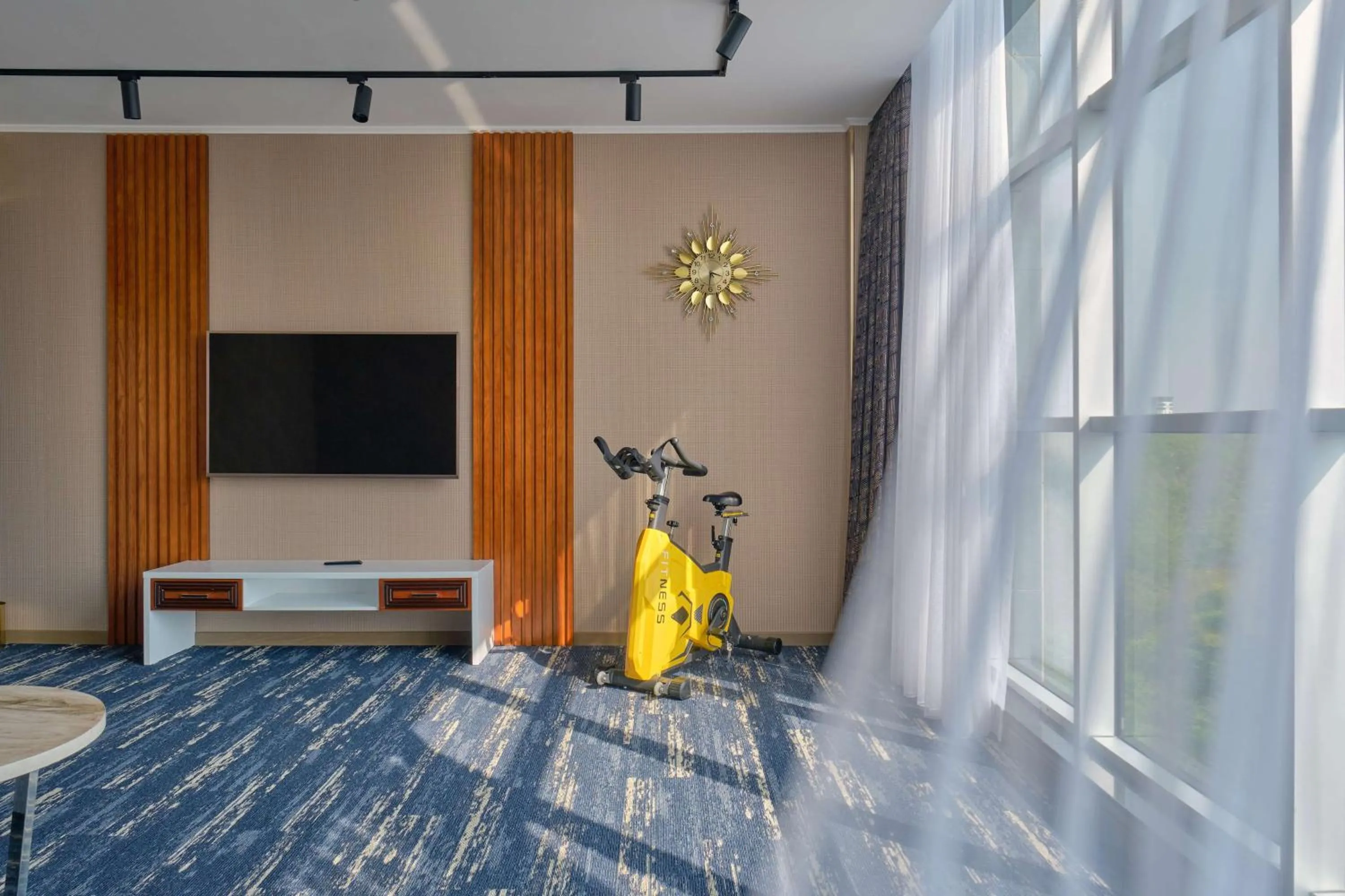 Communal lounge/ TV room in Panarams Tashkent Hotel, a member of Radisson Individuals