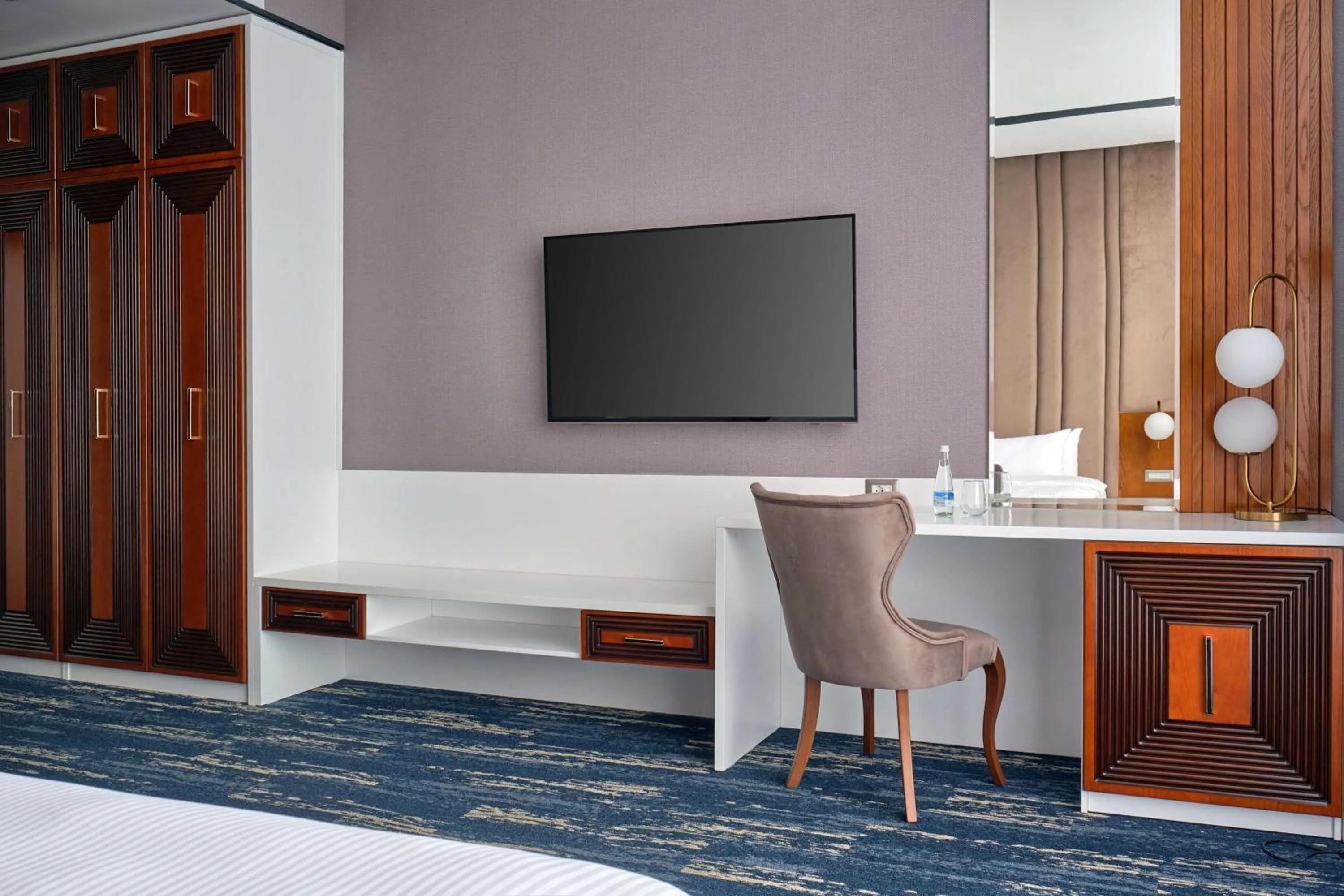 Communal lounge/ TV room in Panarams Tashkent Hotel, a member of Radisson Individuals