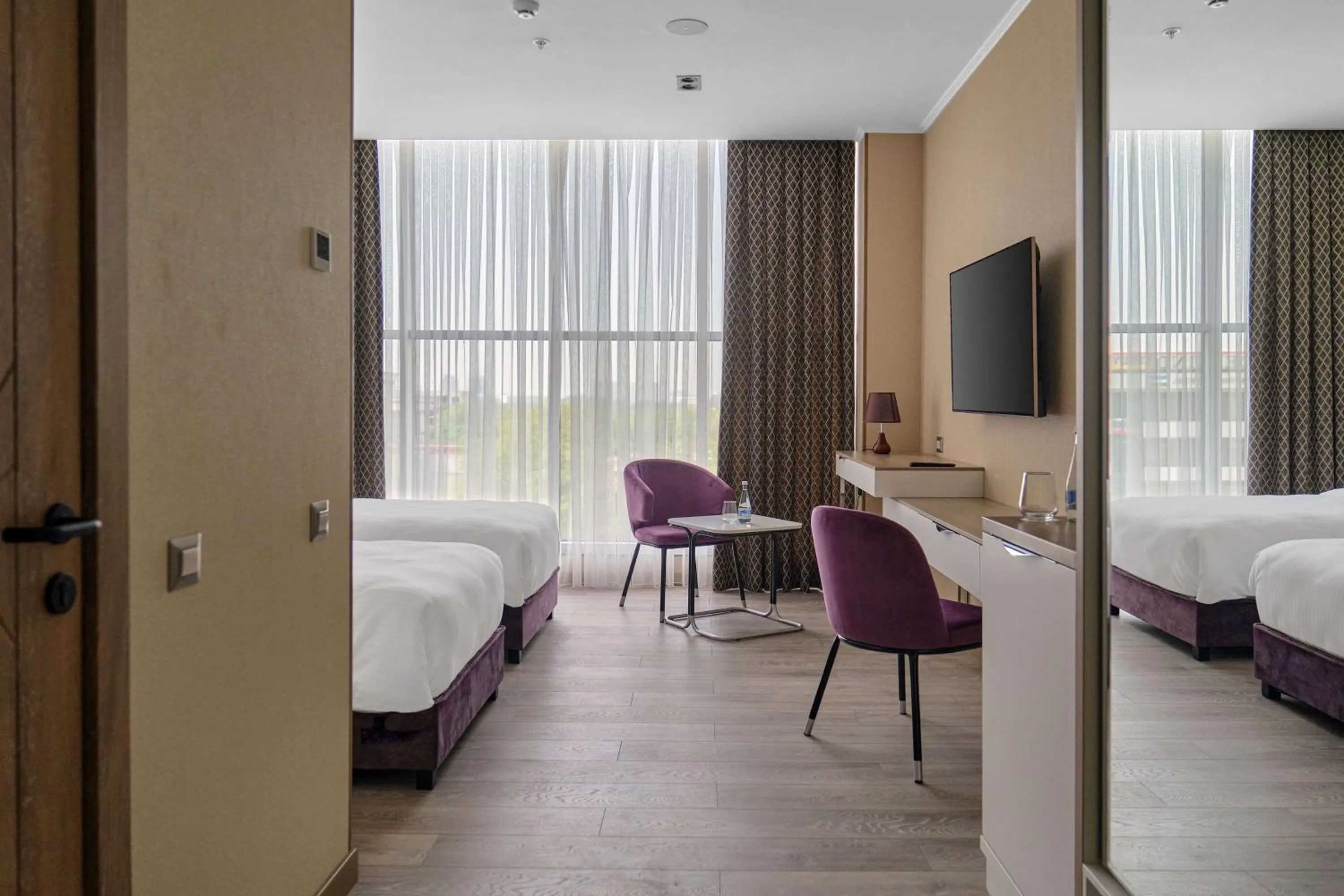 Bedroom, Bed in Panarams Tashkent Hotel, a member of Radisson Individuals