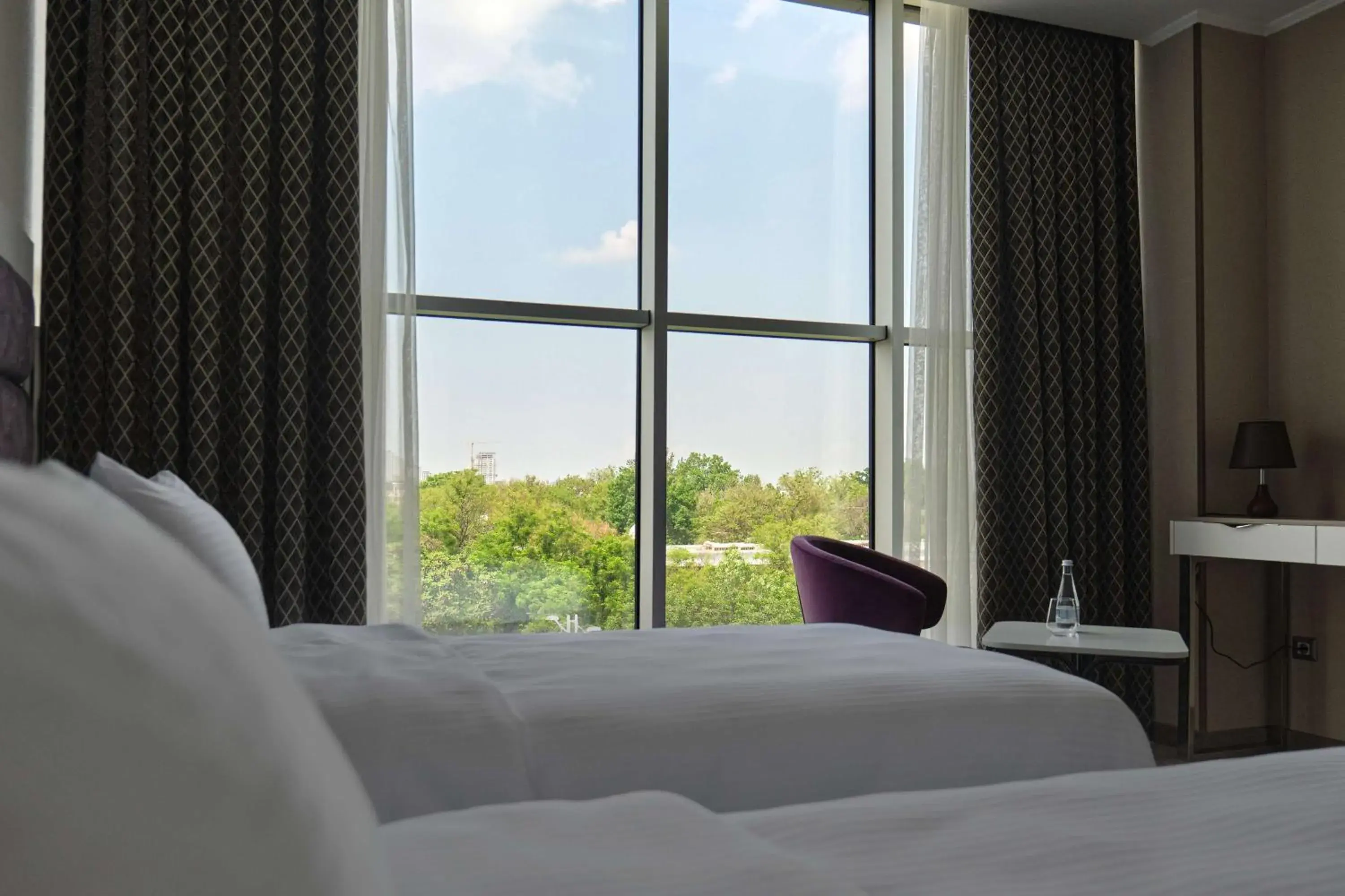 View (from property/room), Bed in Panarams Tashkent Hotel, a member of Radisson Individuals View (from property/room), Bed in Panarams Tashkent Hotel, a member of Radisson Individuals