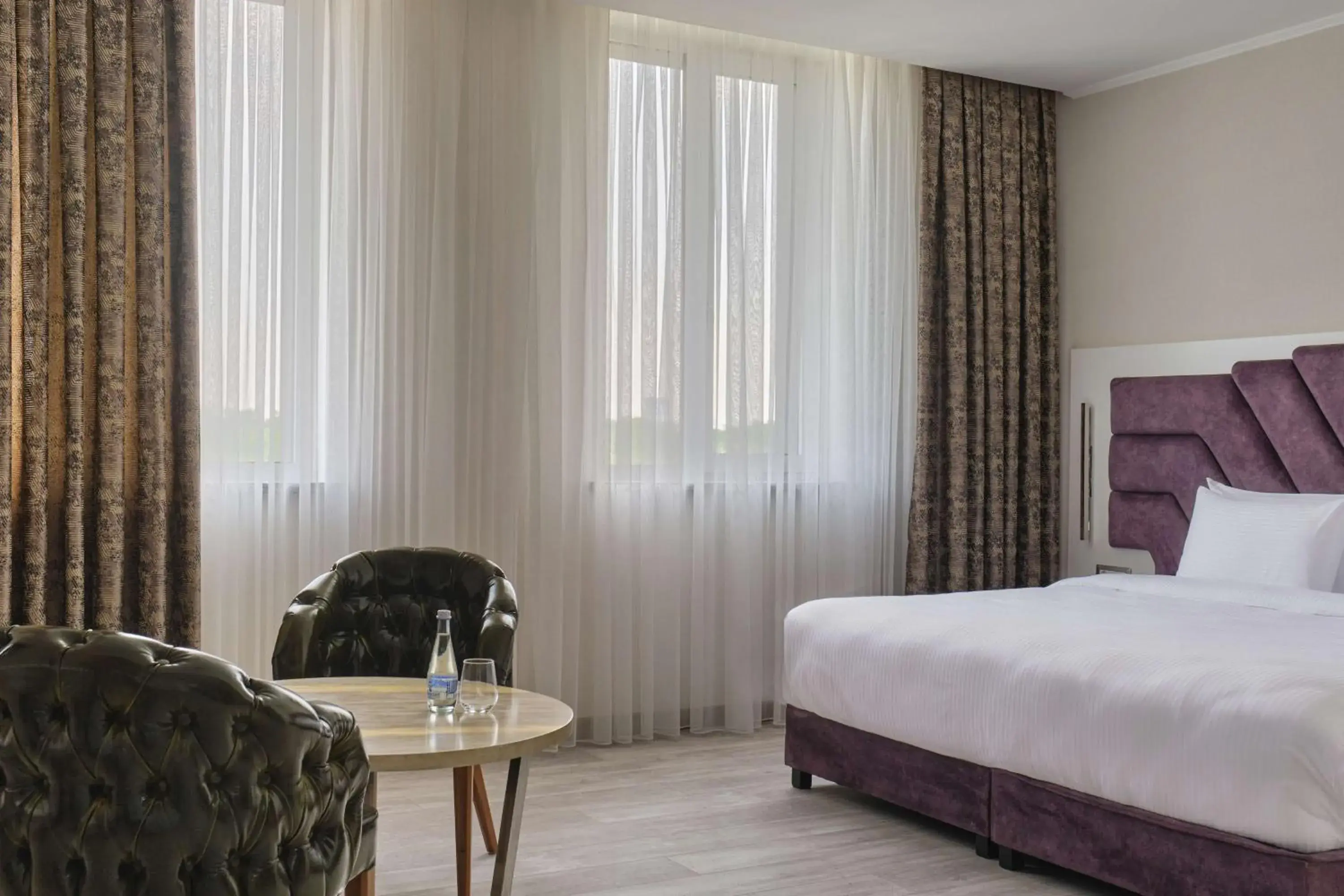 Bedroom, Bed in Panarams Tashkent Hotel, a member of Radisson Individuals Bedroom, Bed in Panarams Tashkent Hotel, a member of Radisson Individuals