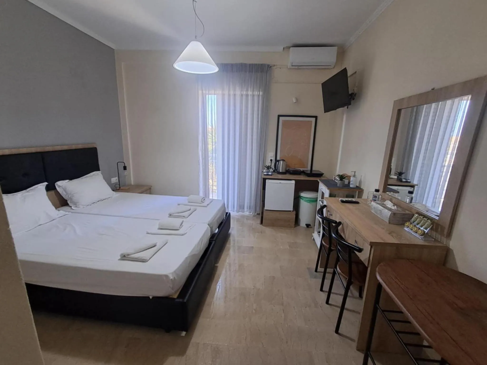 Bed in Ionian Boutique Apartments - Corfu Seaside Getaways