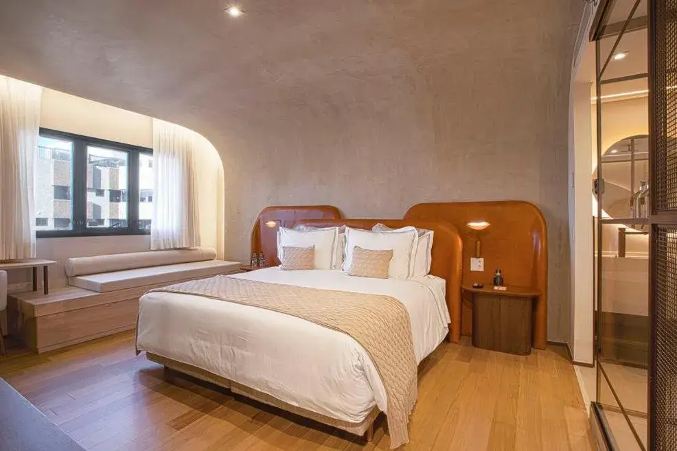 Bed in QOYA Hotel Curitiba, Curio Collection by Hilton Bed in QOYA Hotel Curitiba, Curio Collection by Hilton