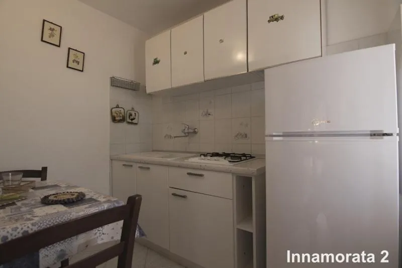 Kitchen or kitchenette in Residential Hotel Villaggio Innamorata