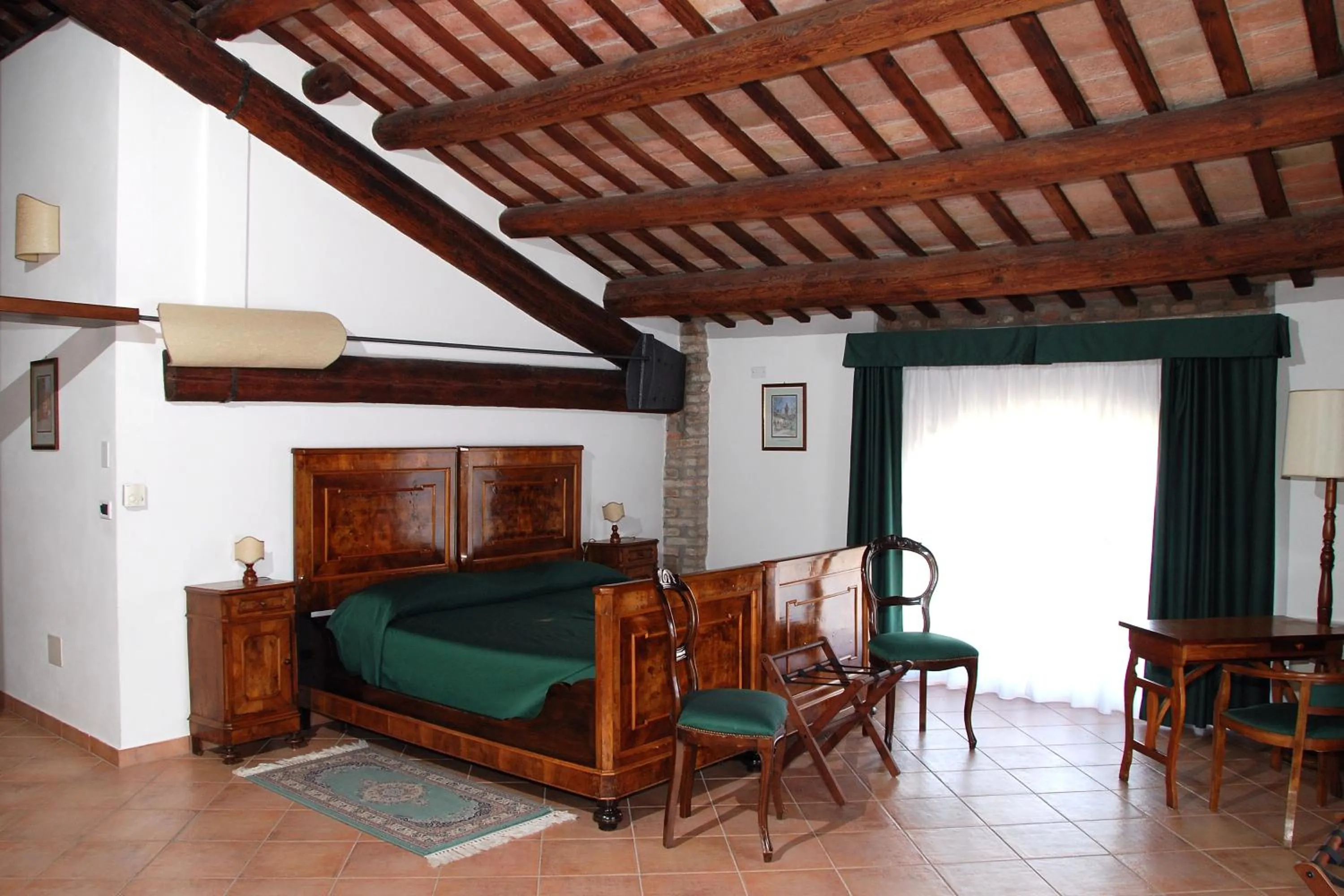Photo of the whole room in Agriturismo-R&B Corte dei Gioghi