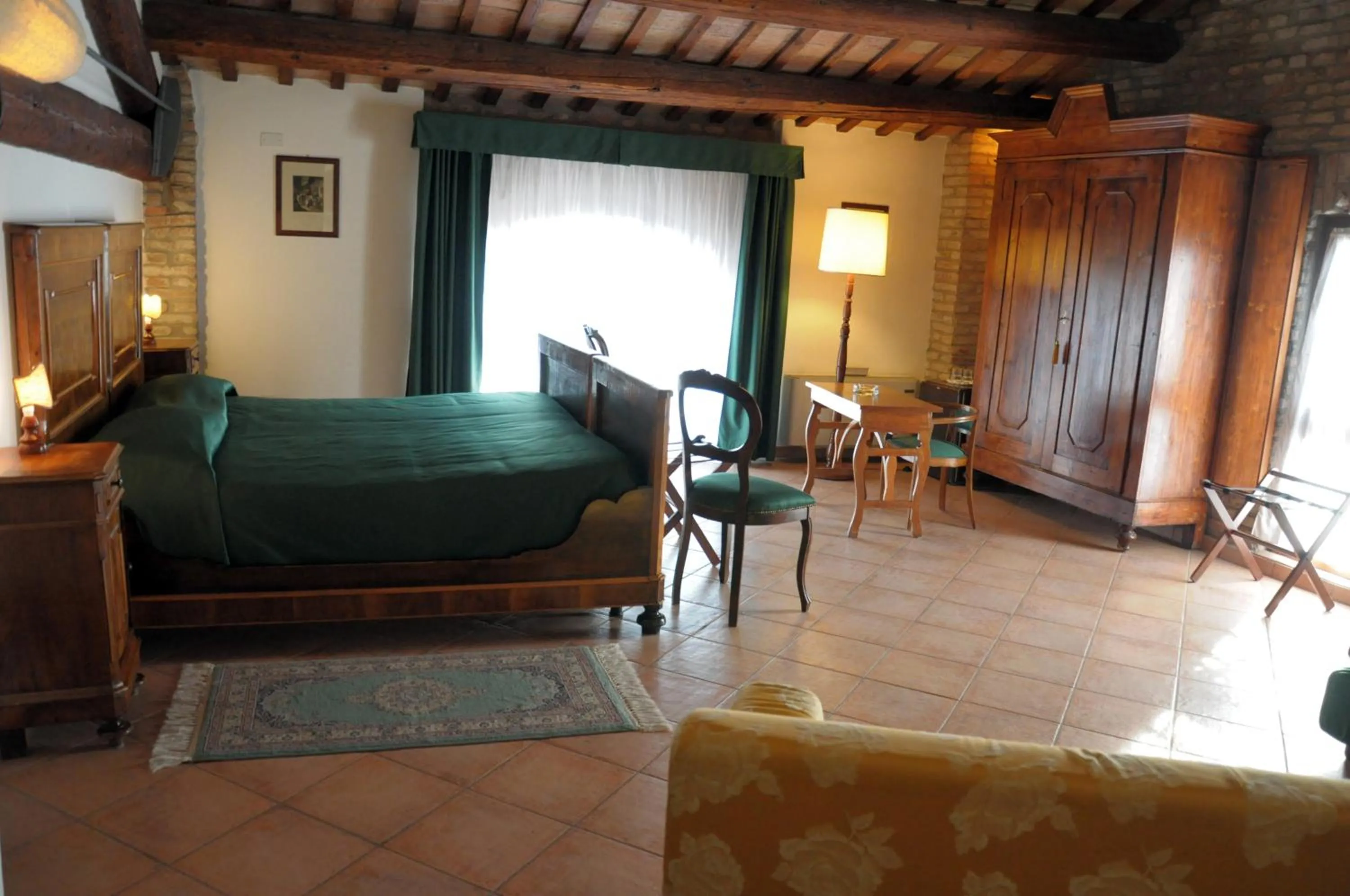Decorative detail, Bed in Agriturismo-R&B Corte dei Gioghi