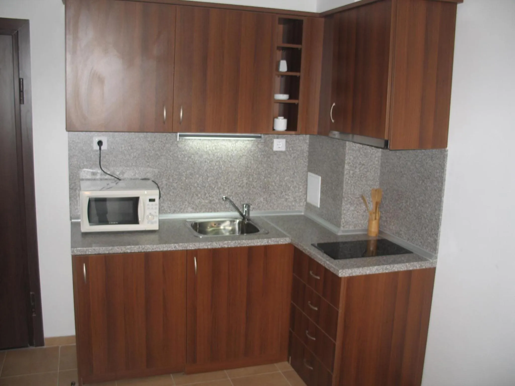 Kitchen or kitchenette in Winslow Infinity Aparthotel