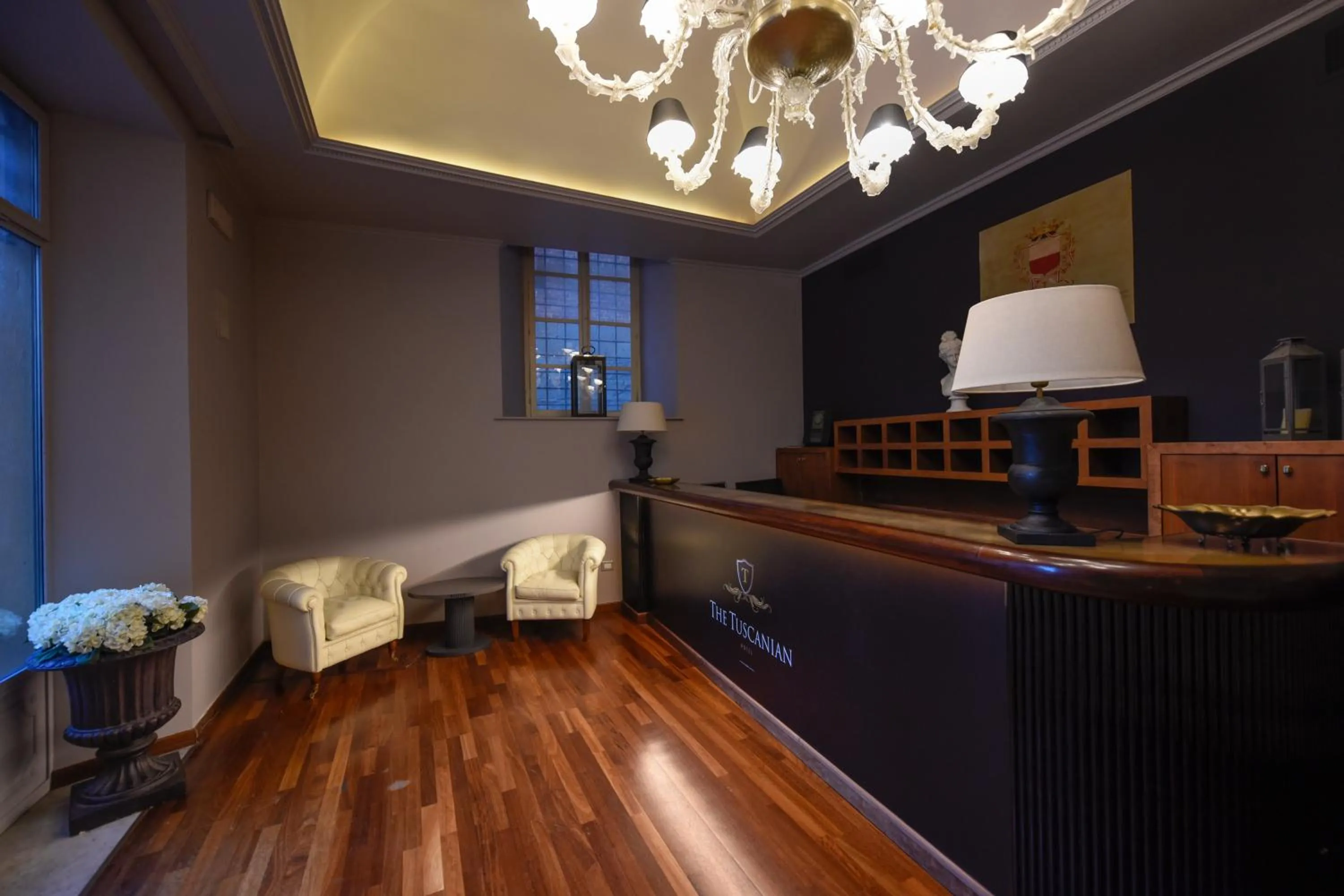 Lobby or reception in The Tuscanian Hotel