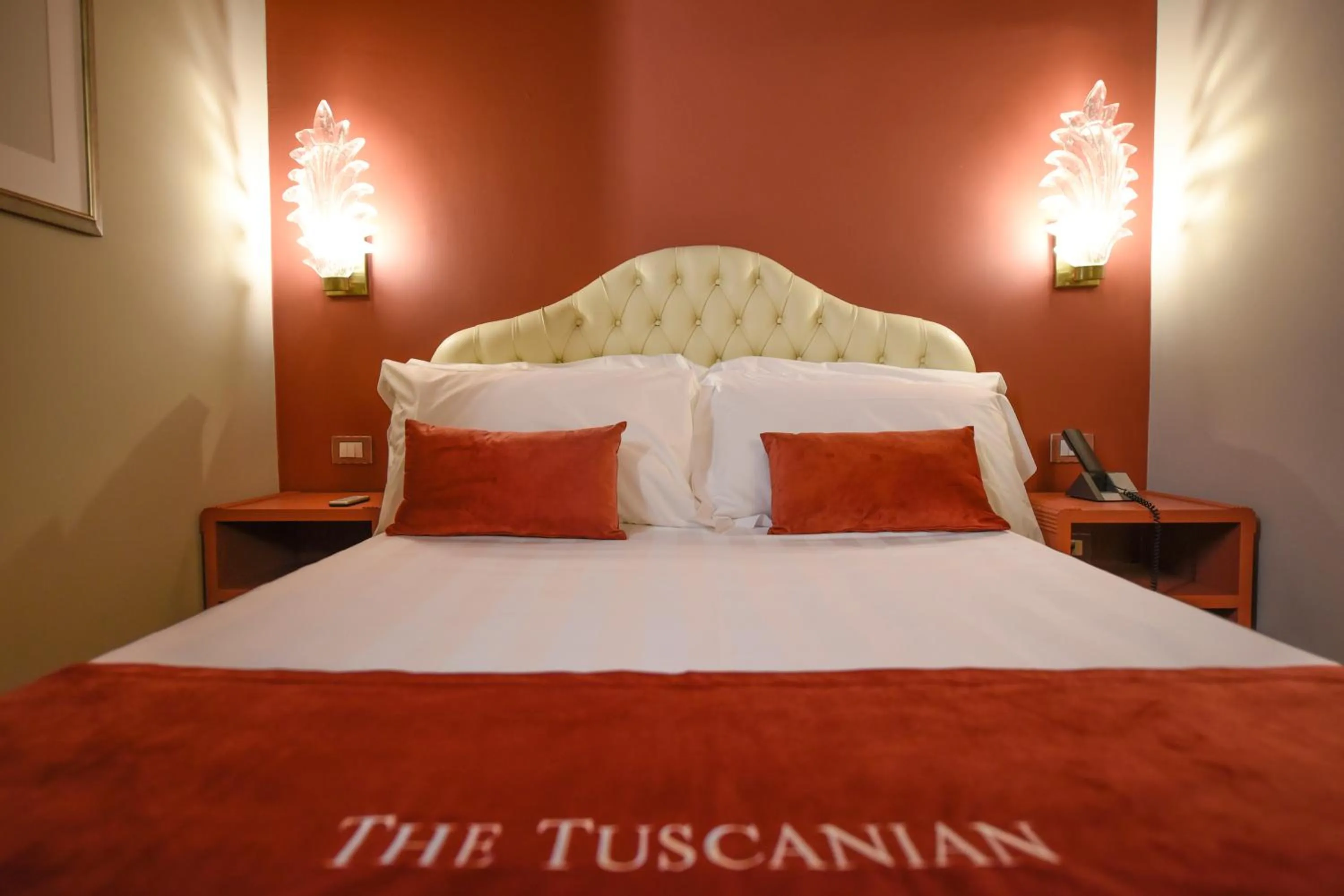 Bed in The Tuscanian Hotel