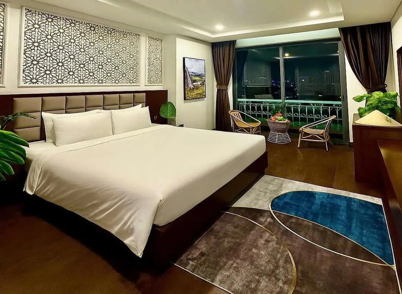 Living room, Bed in Century Hotel Da Nang