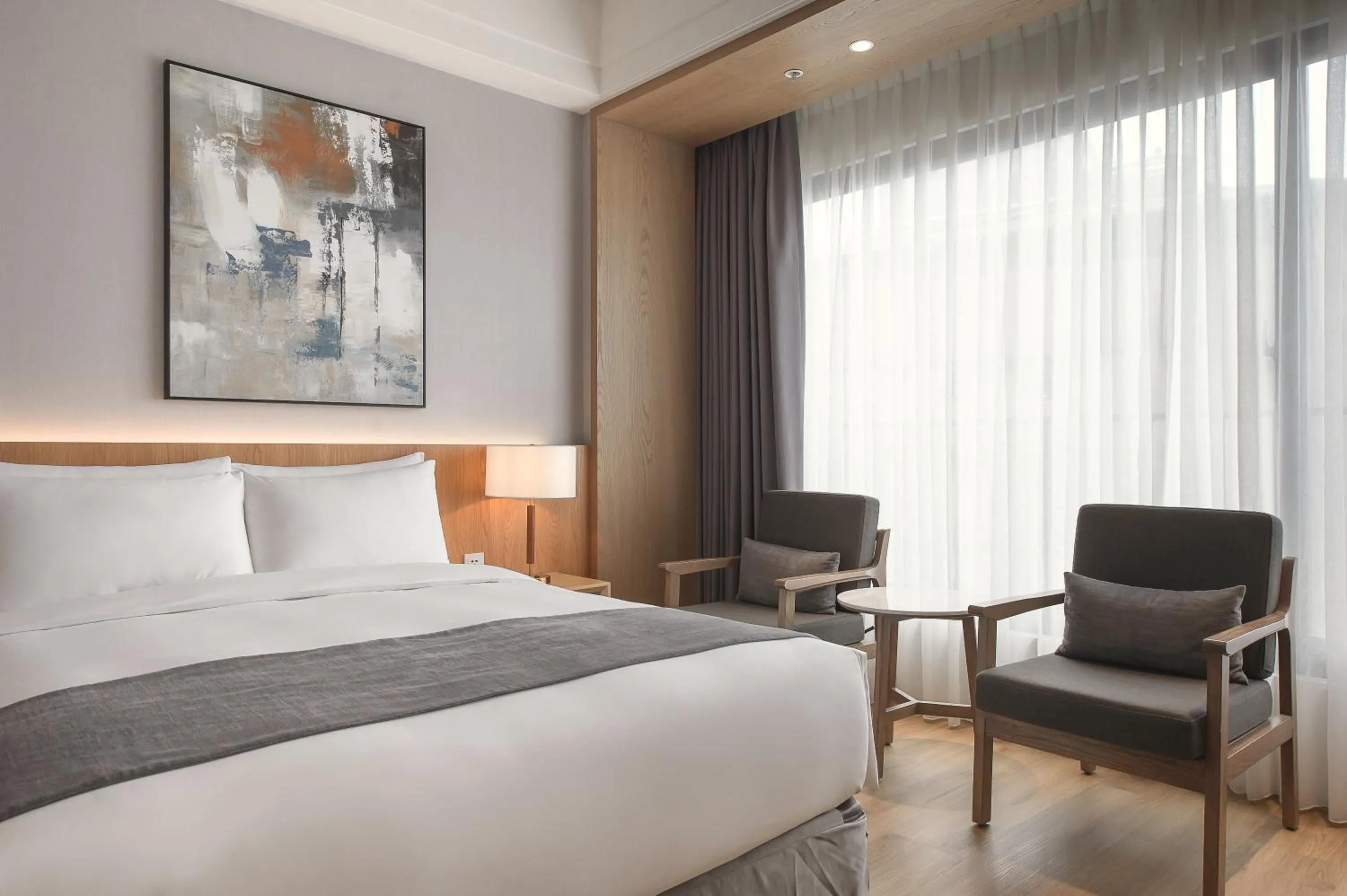 Photo of the whole room, Bed in Grand Banyan Hotel