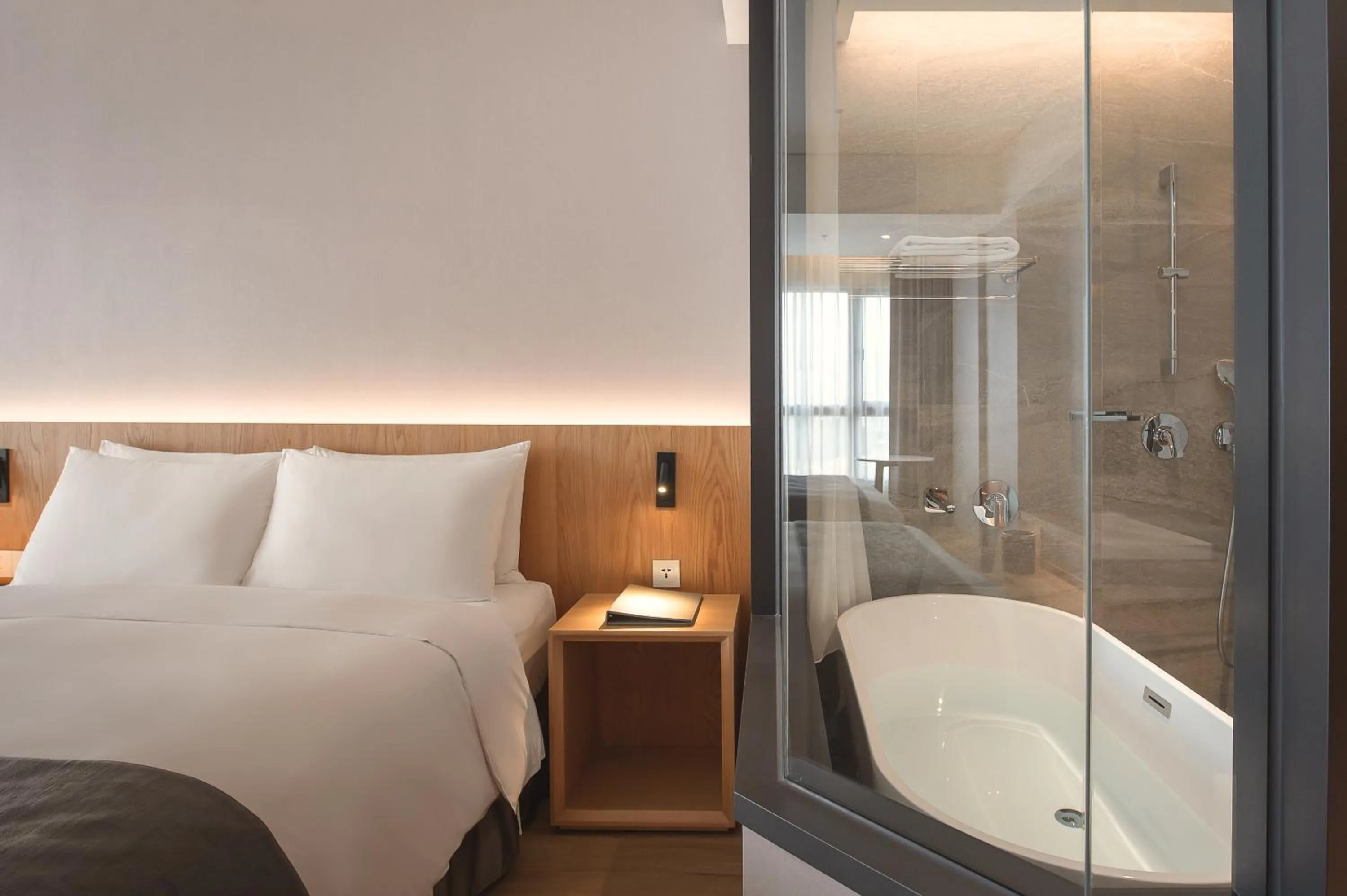 Bed in Grand Banyan Hotel