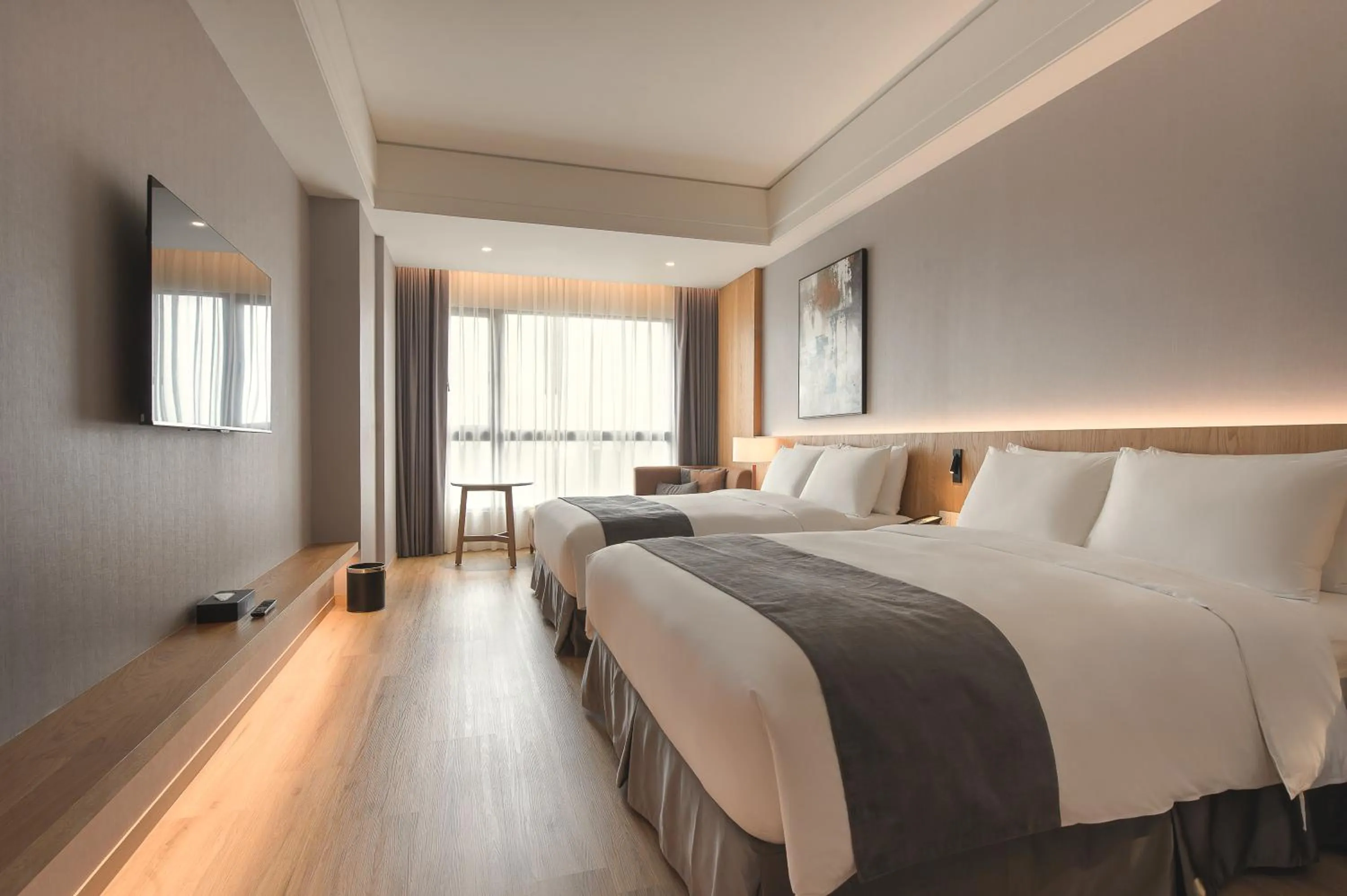 Bed in Grand Banyan Hotel