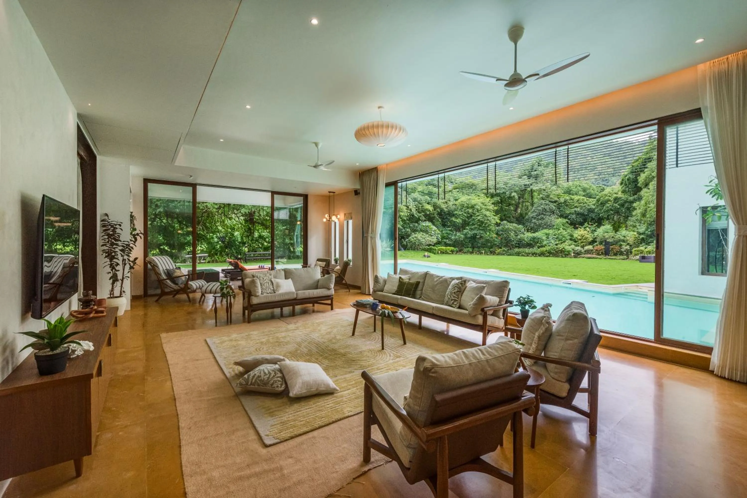 Living room in SaffronStays Estella, Alibaug