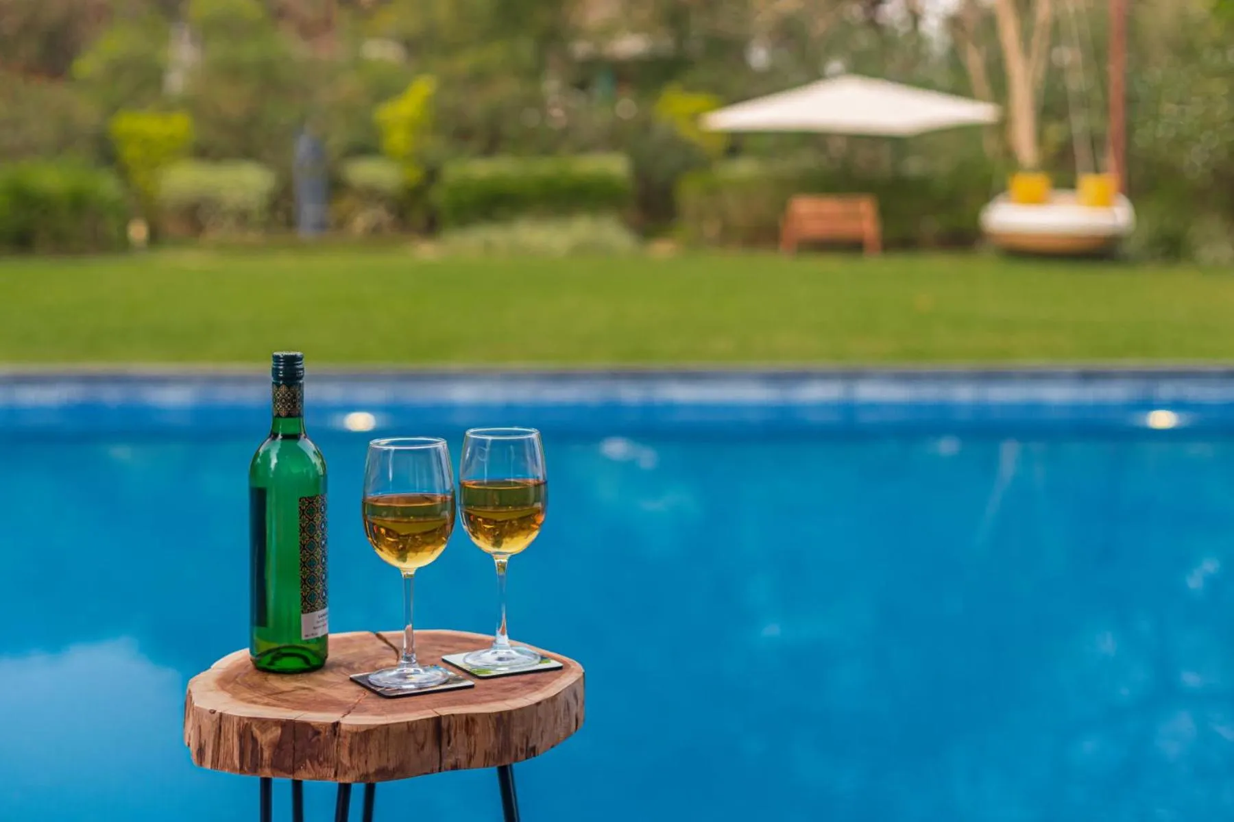 Swimming pool in SaffronStays Estella, Alibaug