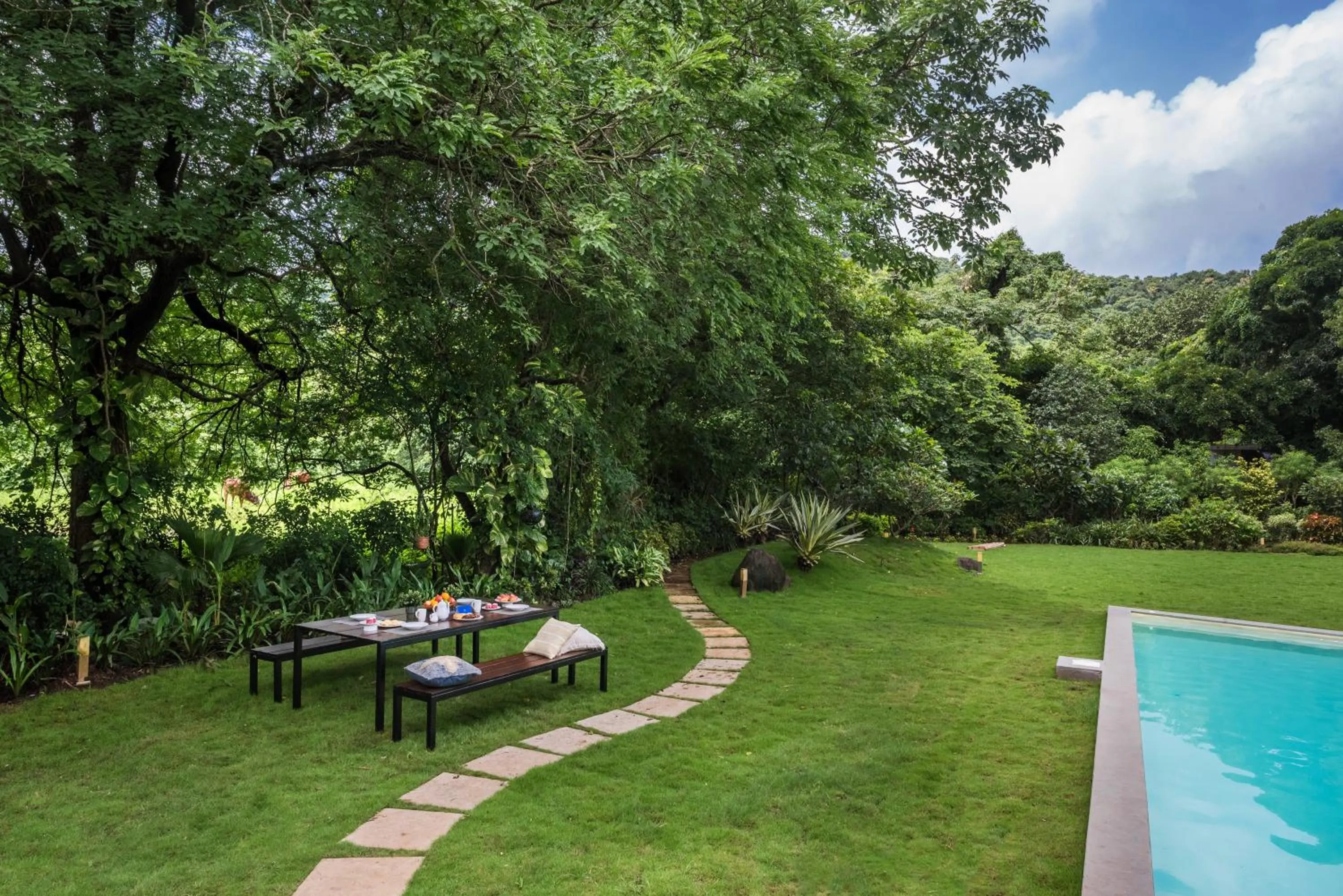 Garden in SaffronStays Estella, Alibaug