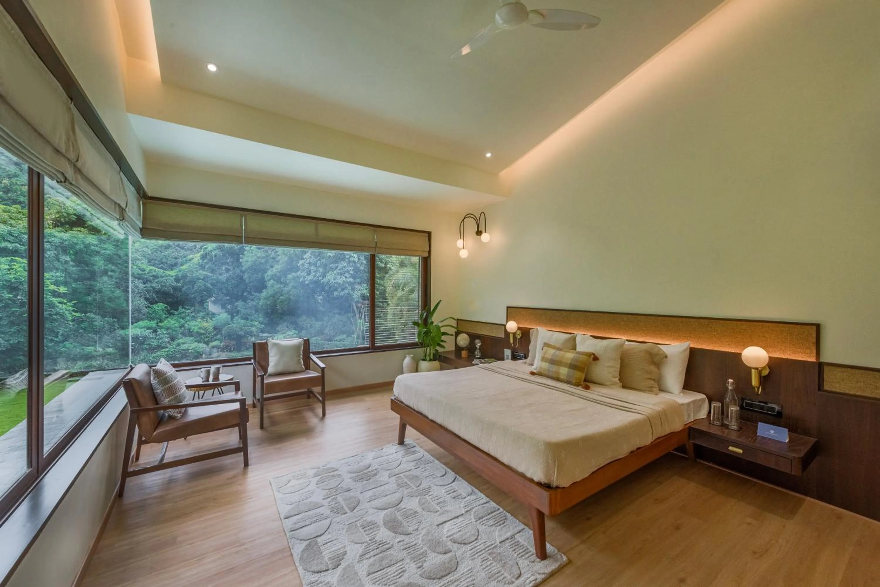 Bed in SaffronStays Estella, Alibaug