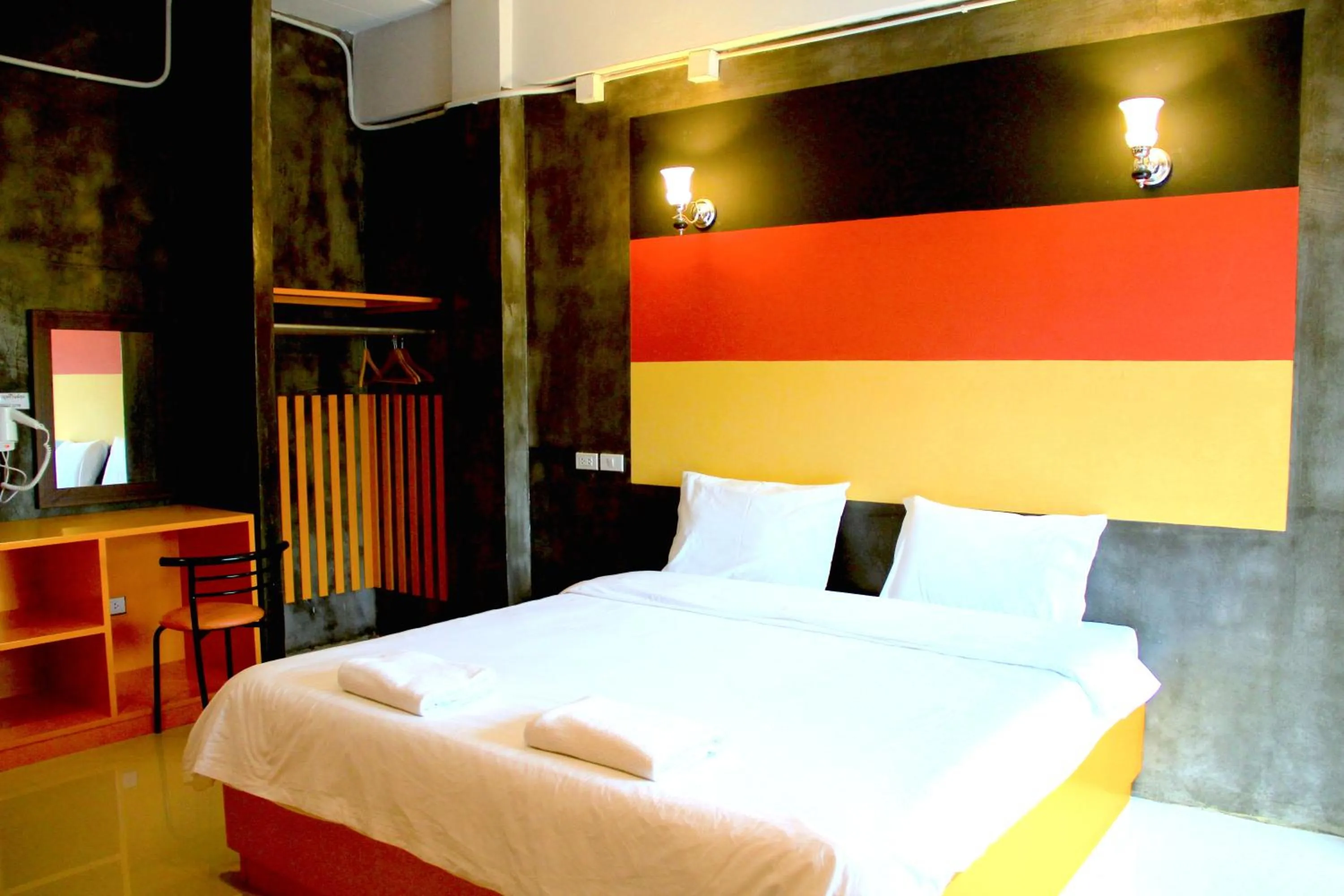 Bed in The Cottage Lampang