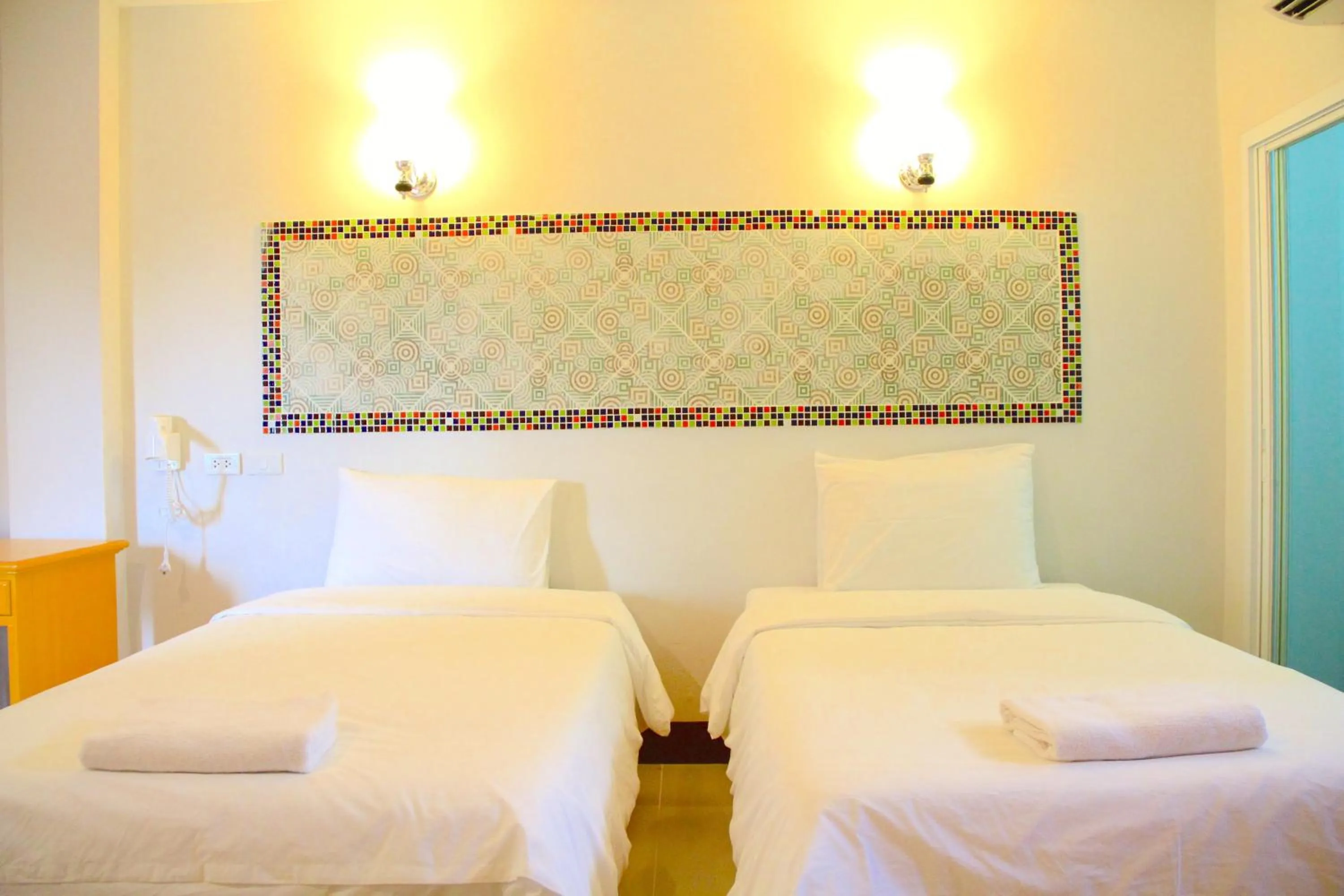 Bed in The Cottage Lampang