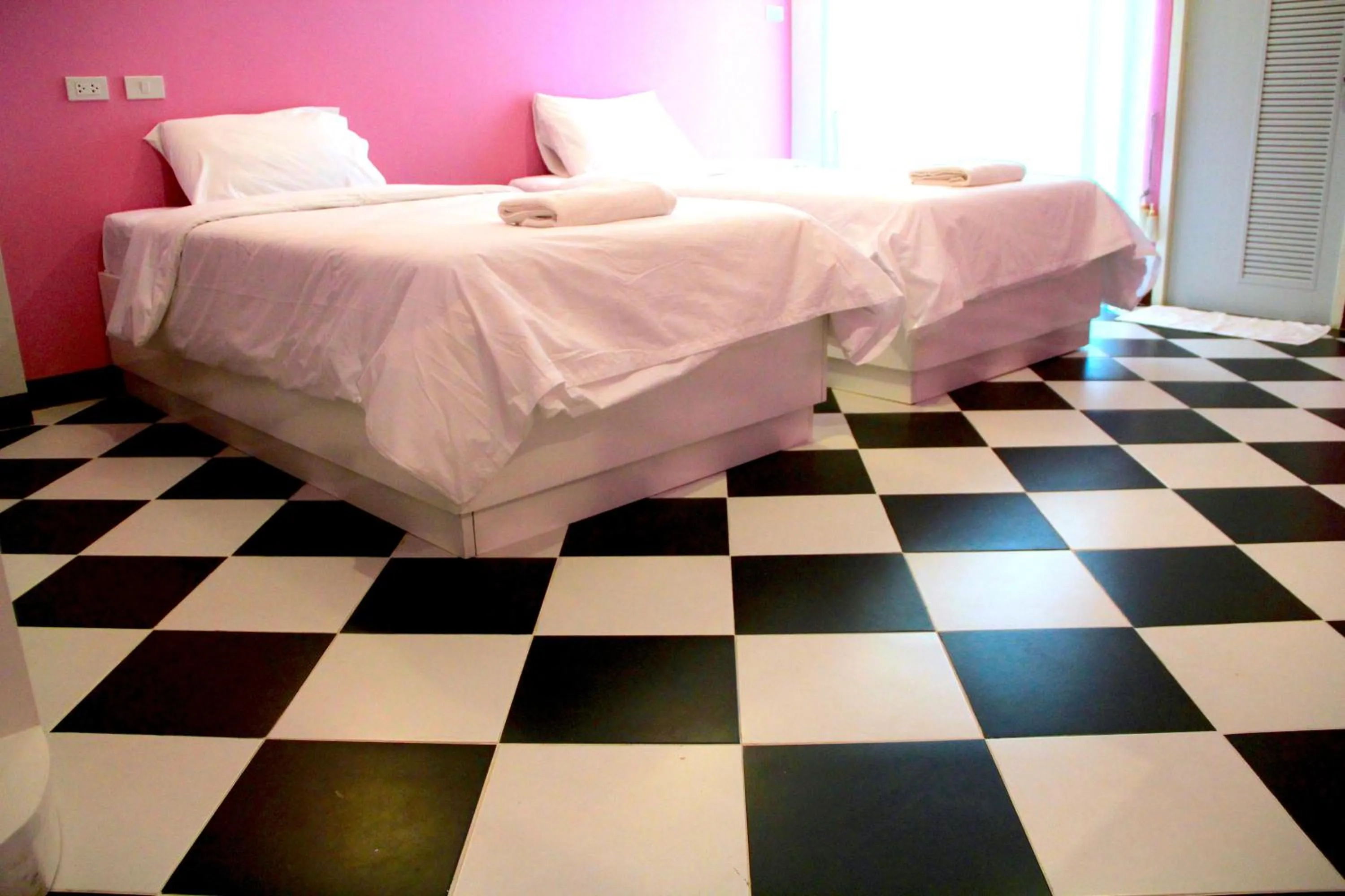 Bed in The Cottage Lampang