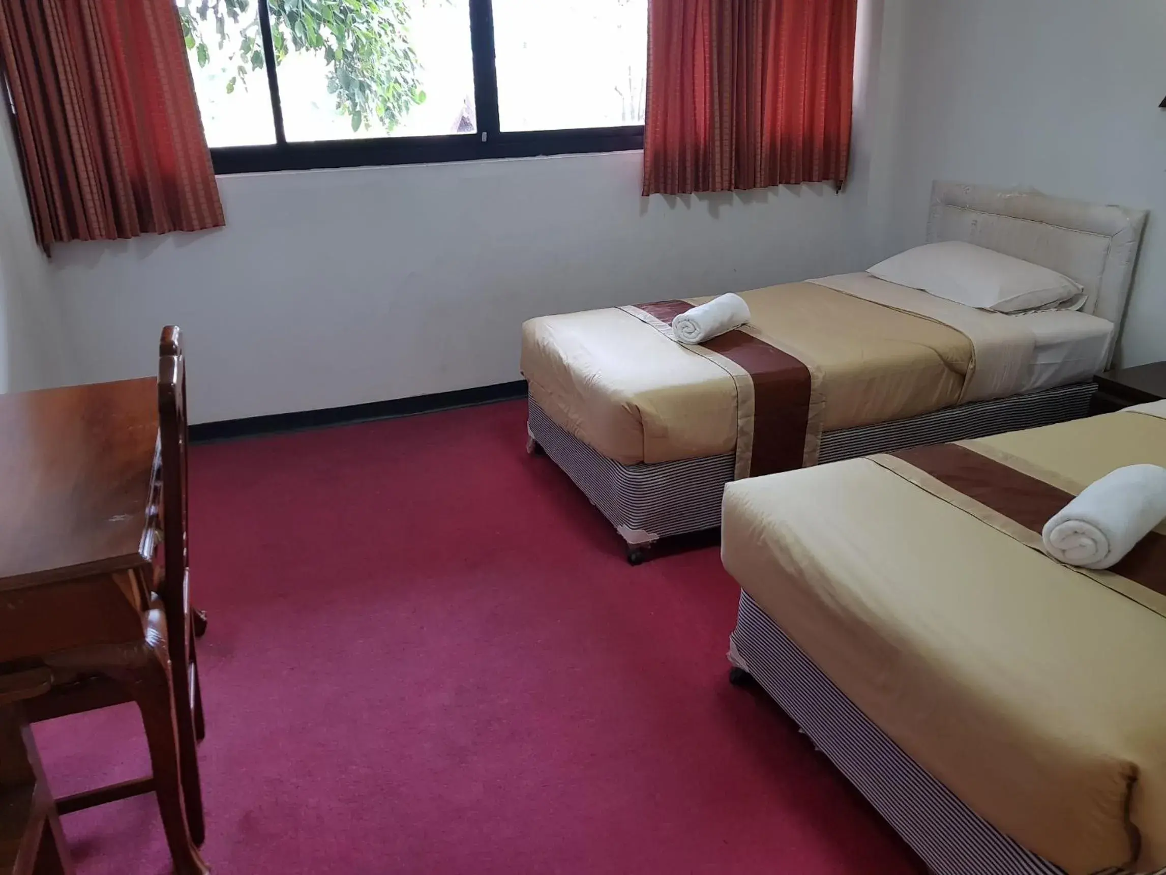 Photo of the whole room, Bed in Punya Garden Hotel Photo of the whole room, Bed in Punya Garden Hotel