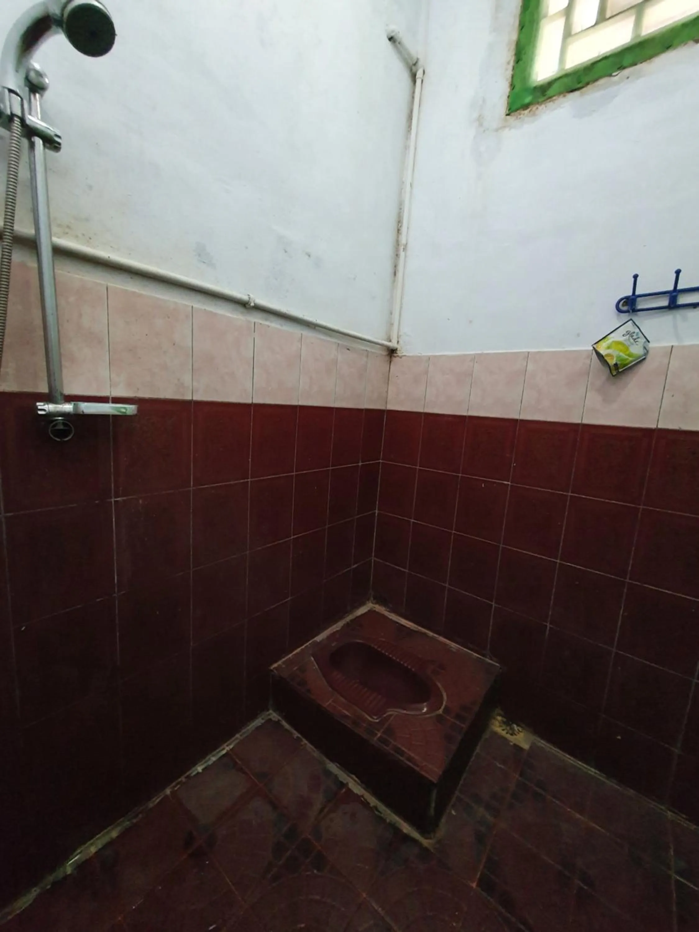 Bathroom in Hotel O Losmen Bunda Arema