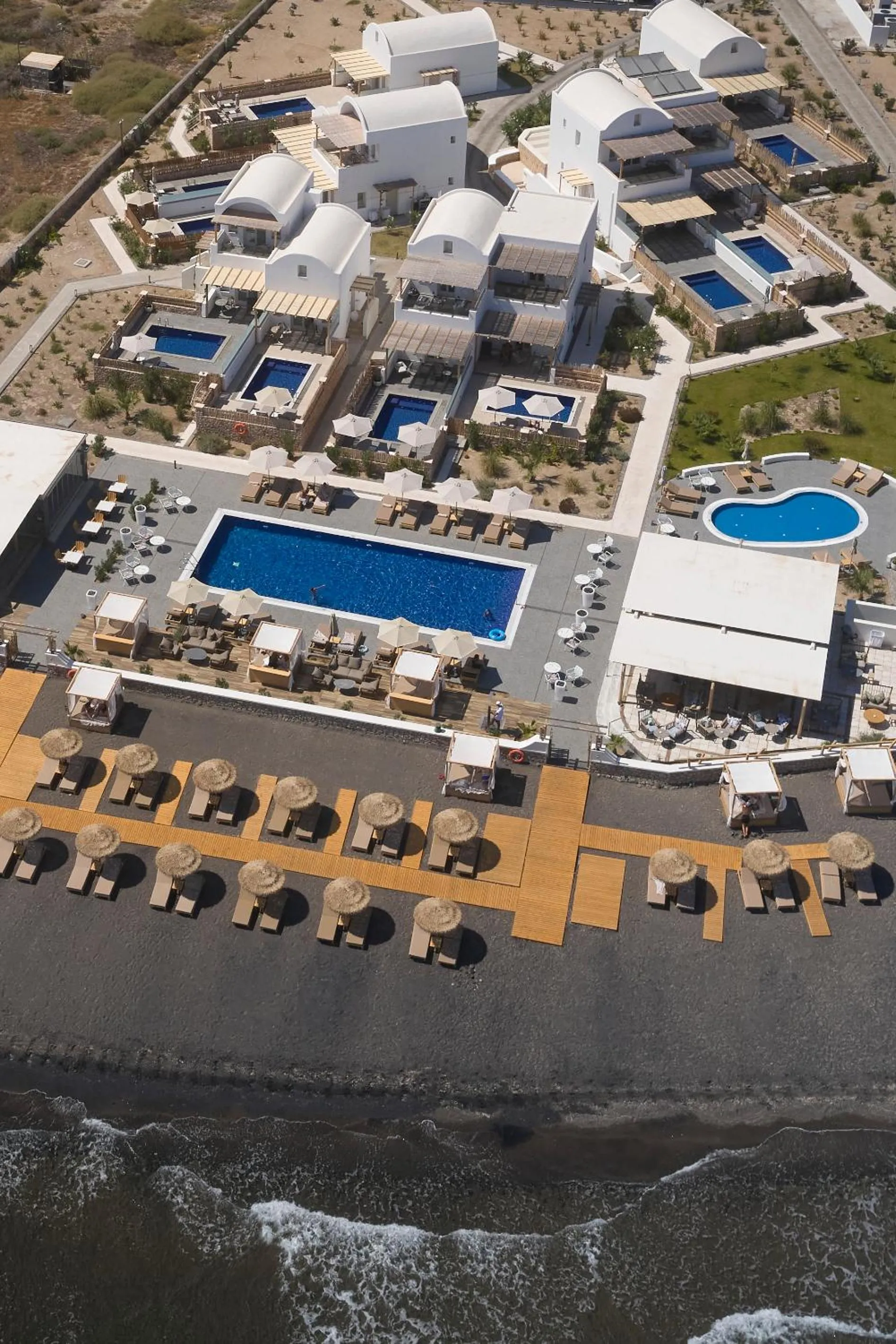 Property building in Sea Breeze Santorini Beach Resort, Curio By Hilton