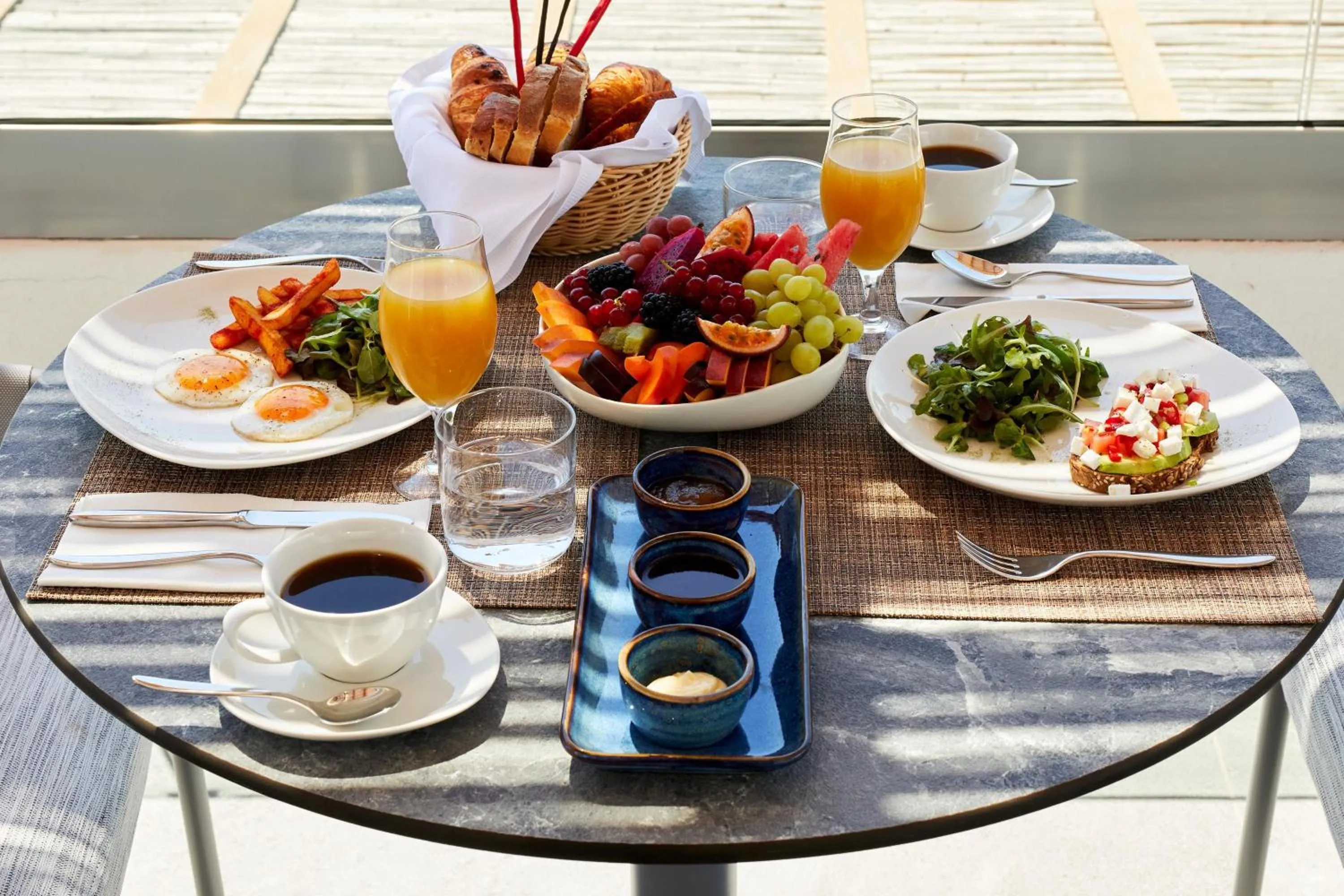 Photo of the whole room in Sea Breeze Santorini Beach Resort, Curio By Hilton
