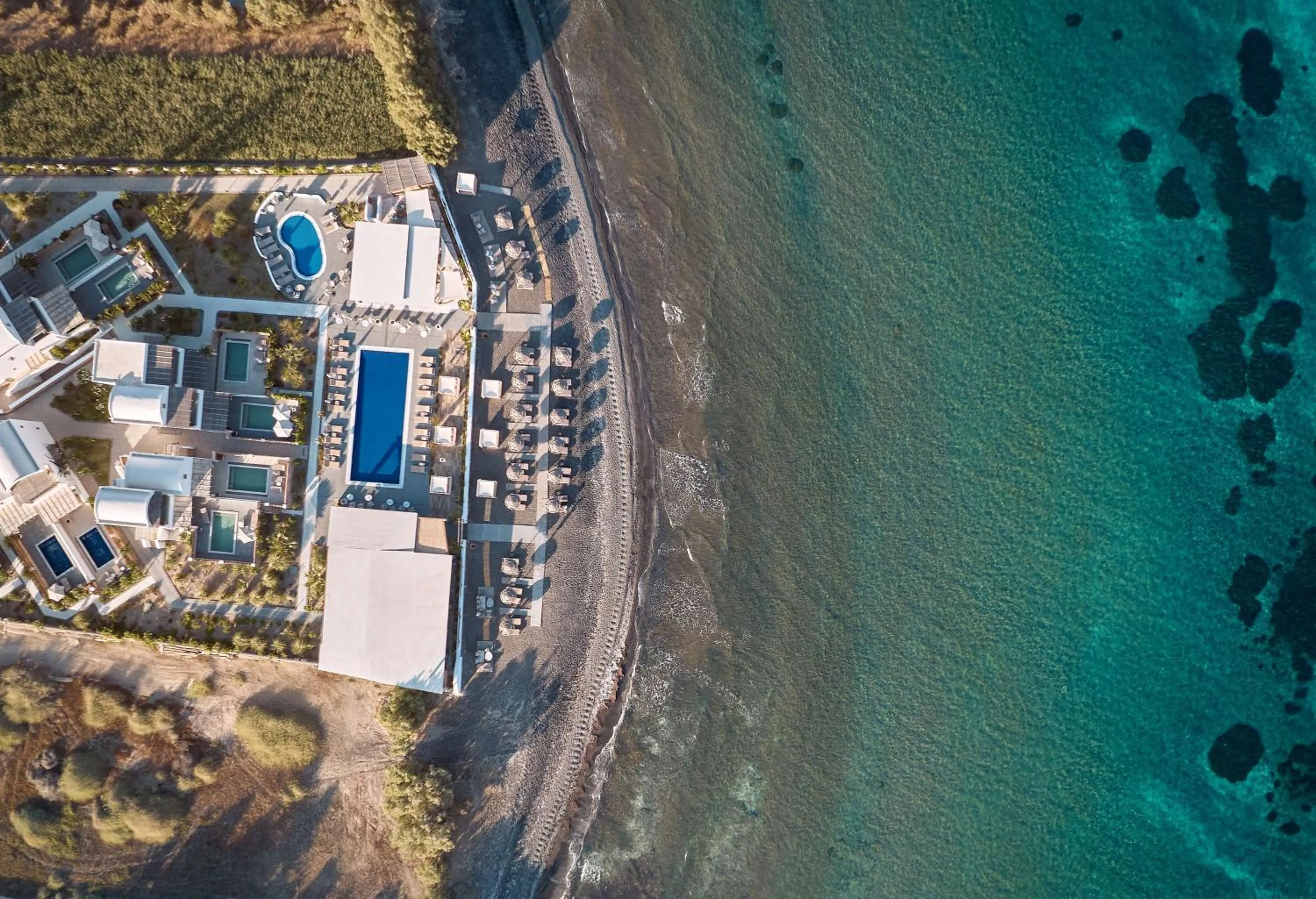 Property building in Sea Breeze Santorini Beach Resort, Curio By Hilton