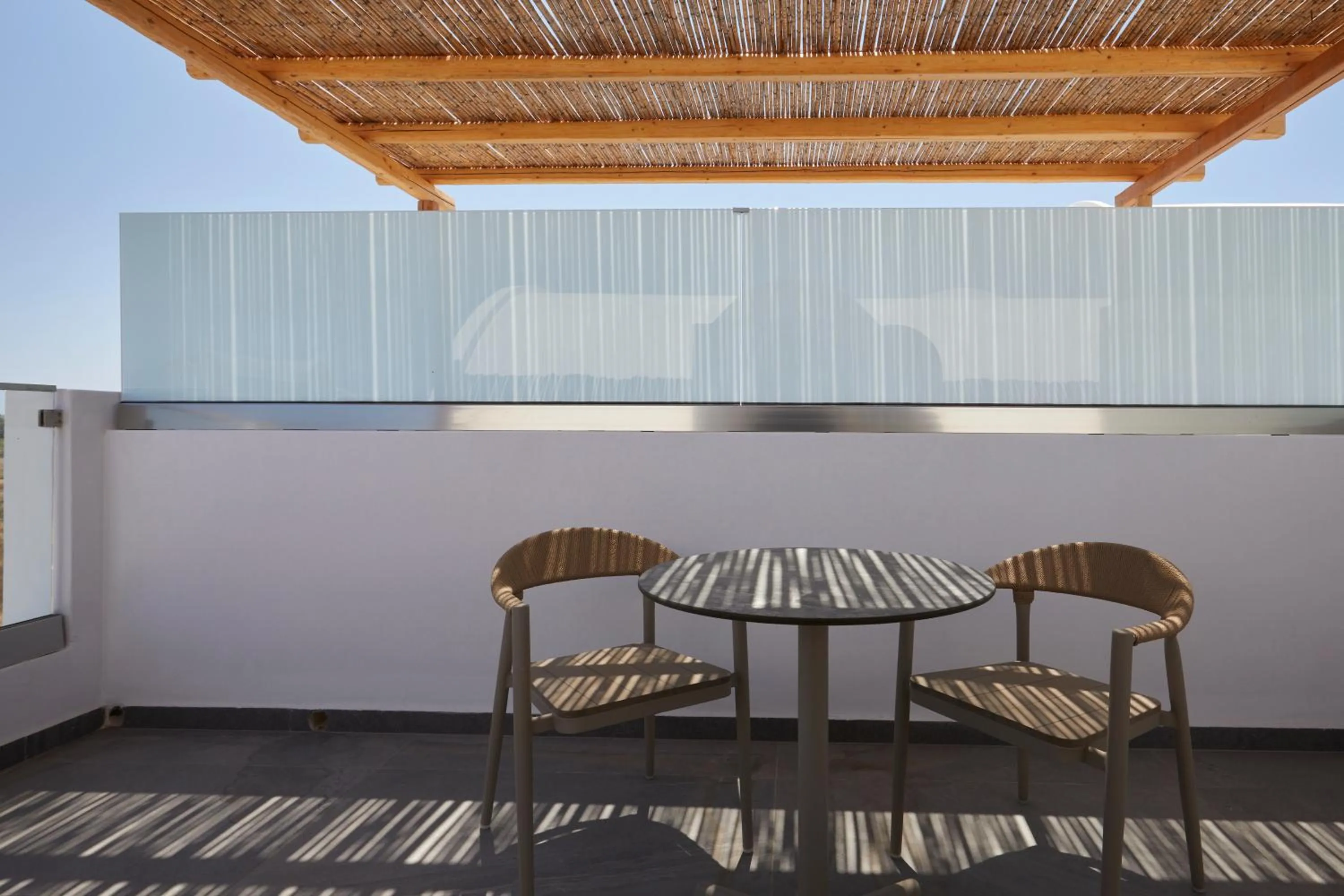 Balcony/Terrace in Sea Breeze Santorini Beach Resort, Curio By Hilton