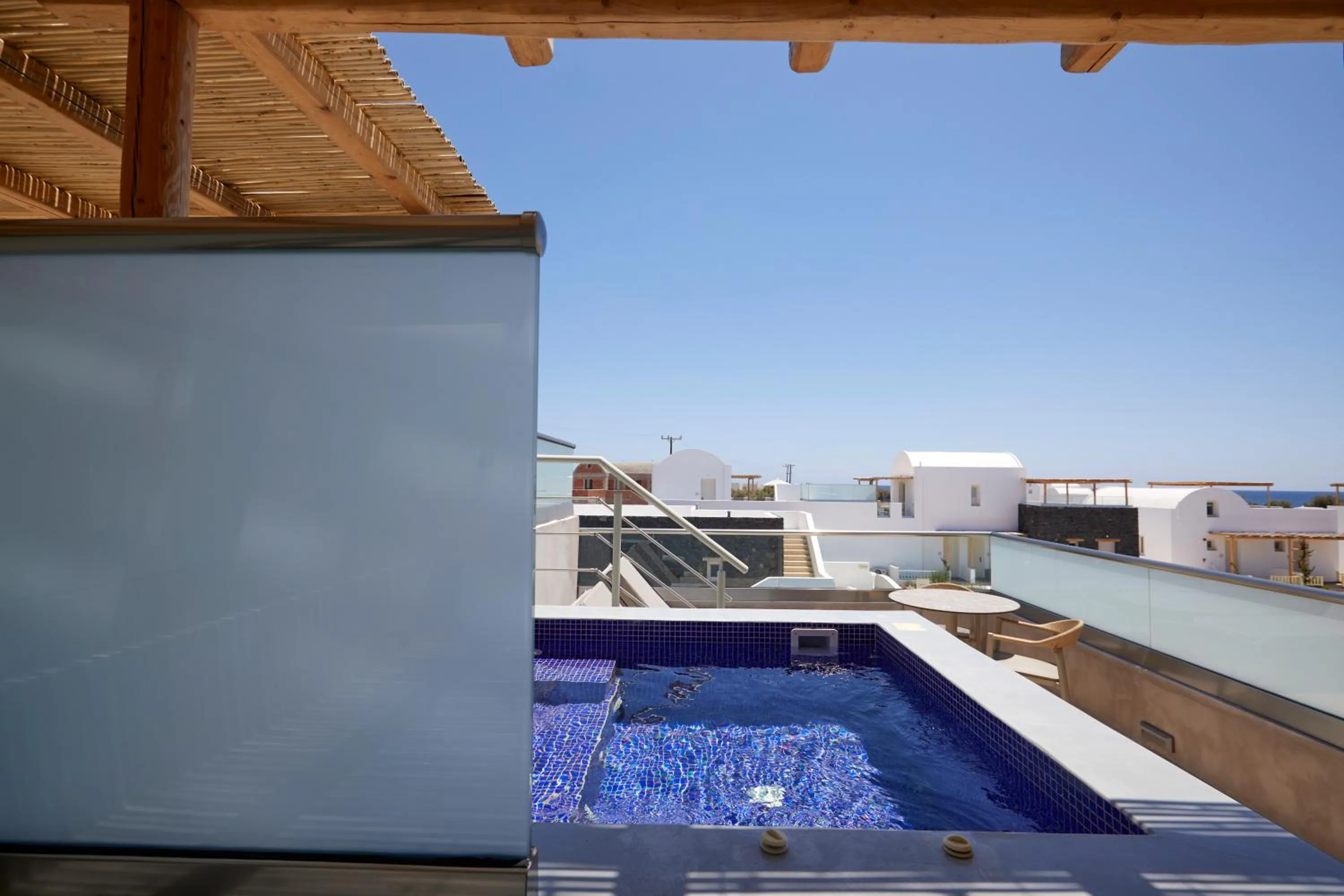 Hot Tub in Sea Breeze Santorini Beach Resort, Curio By Hilton